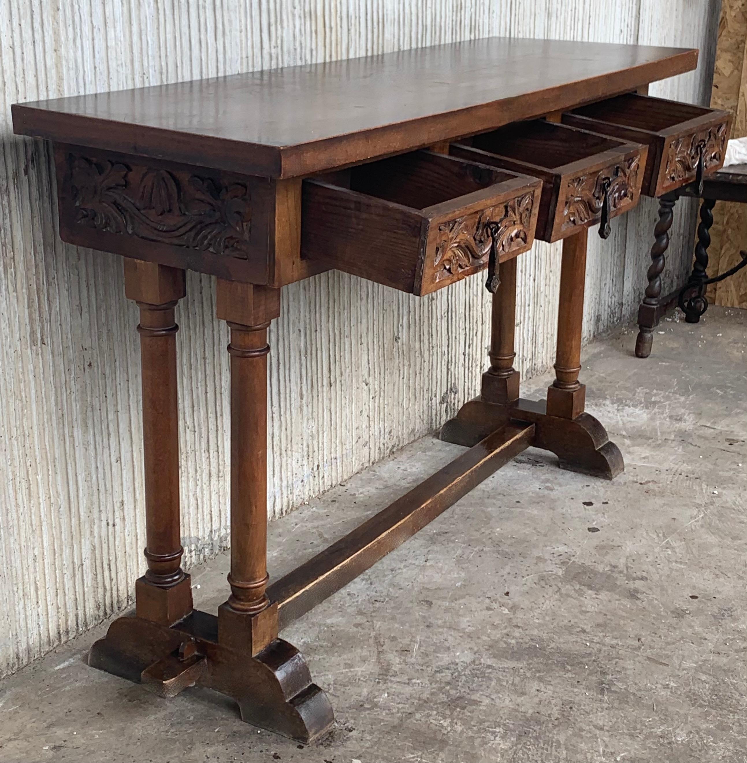 20th Century Carved Three-Drawer Spanish Walnut Console Table with Iron Hardware In Good Condition In Miami, FL
