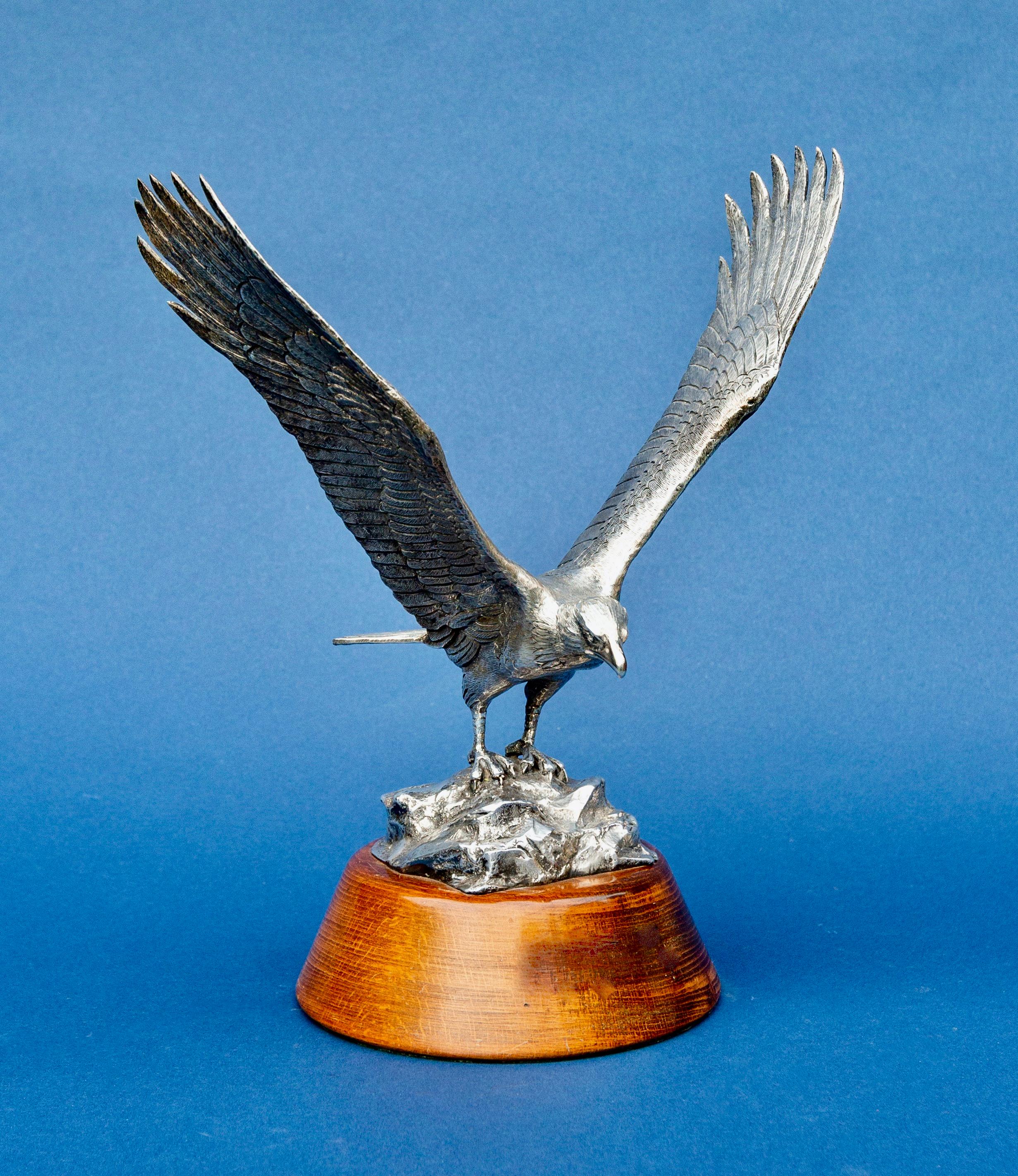 Solid silver model of an eagle, with outstretched wings and realistically chased plumage, by Barnard Bothers, London, 1971.