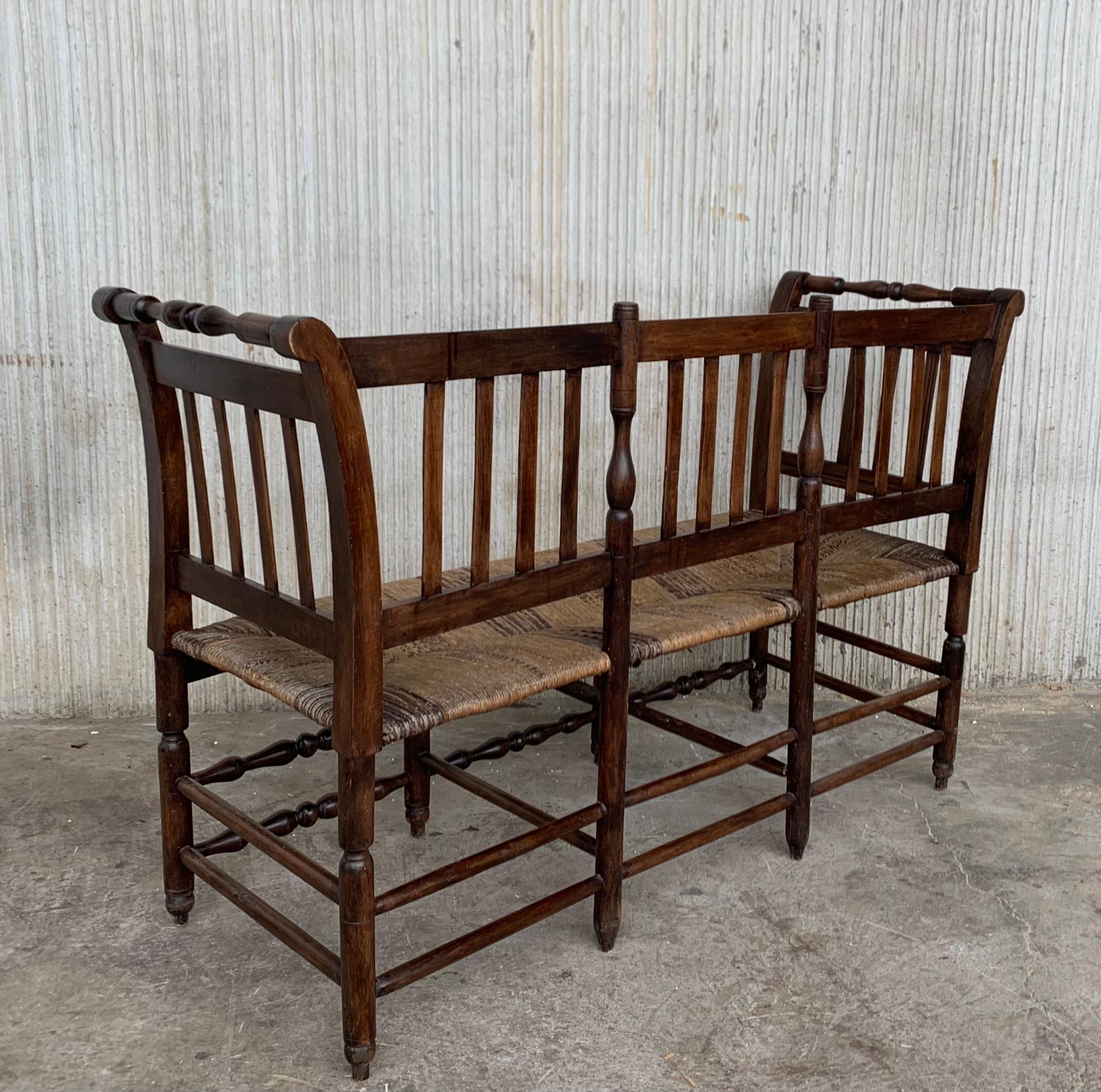 Rare midcentury sofa, settee or bench in the Spanish style with cane back, it has a turned bars typical of this period. Shown in original condition, please note price includes refinishing.


 