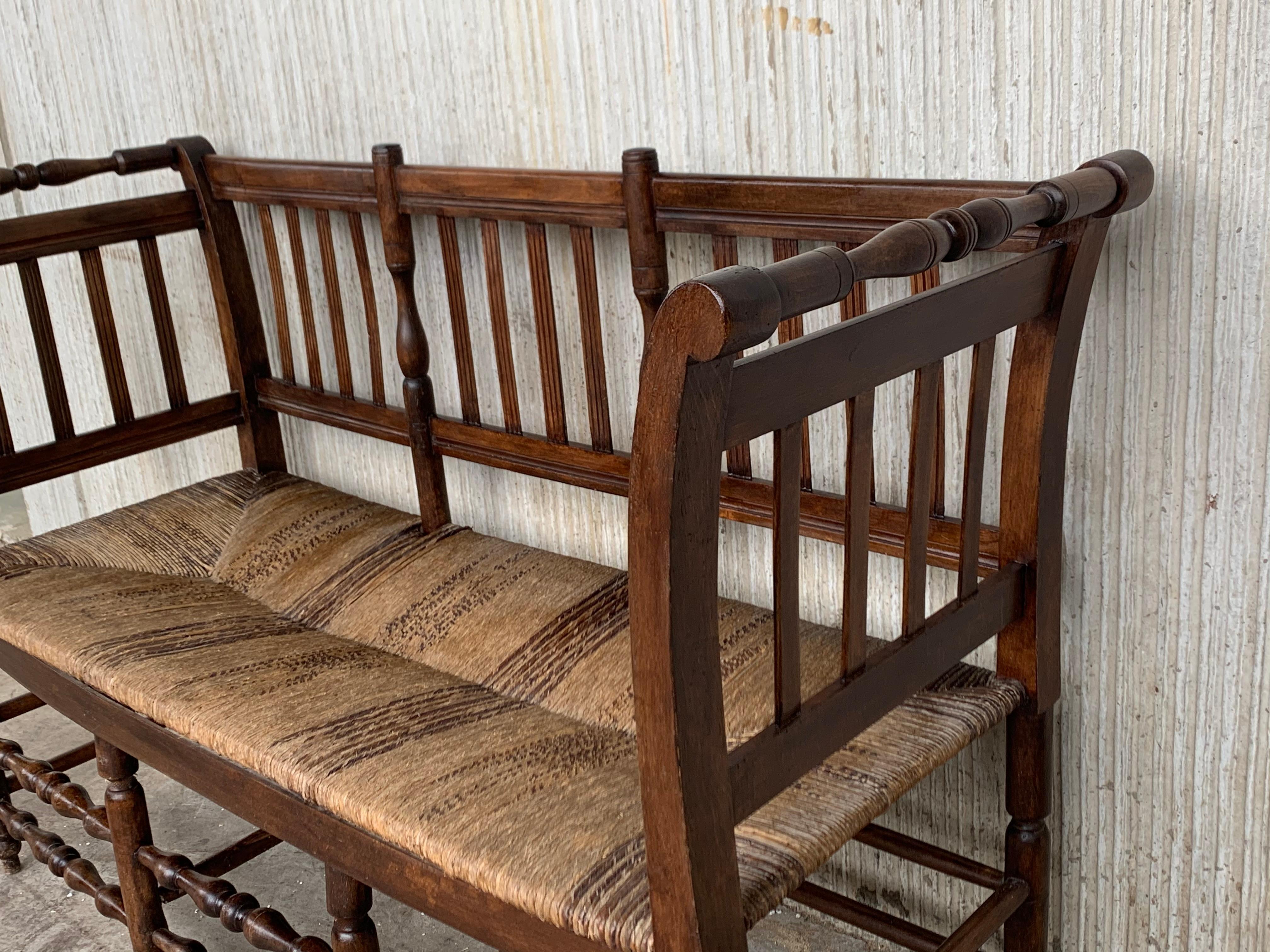 Spanish Colonial 20th Century Catalan Bench in Walnut with Caned Seat For Sale