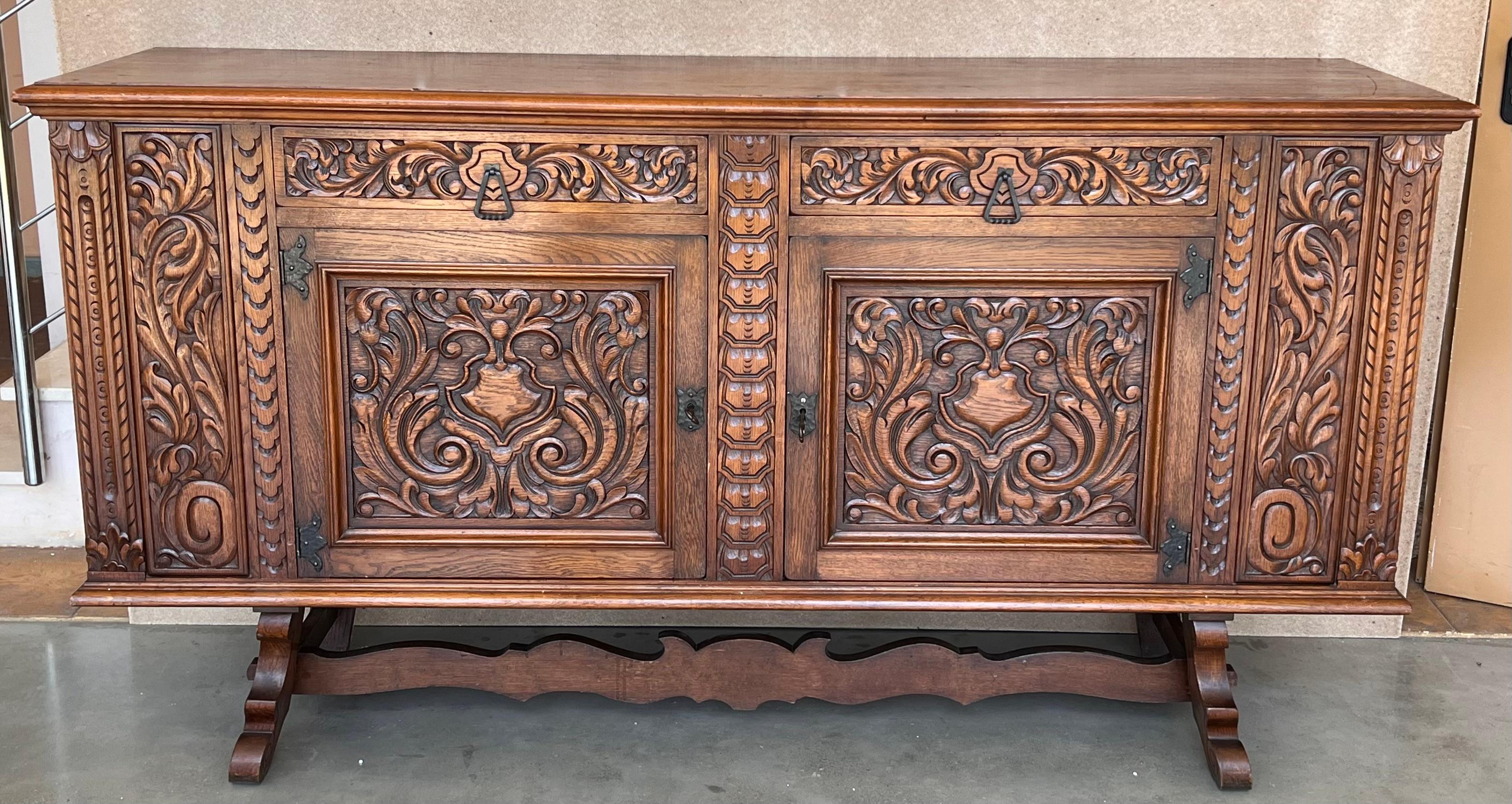 19th century Catalan Spanish buffet with two carved drawers and two doors.