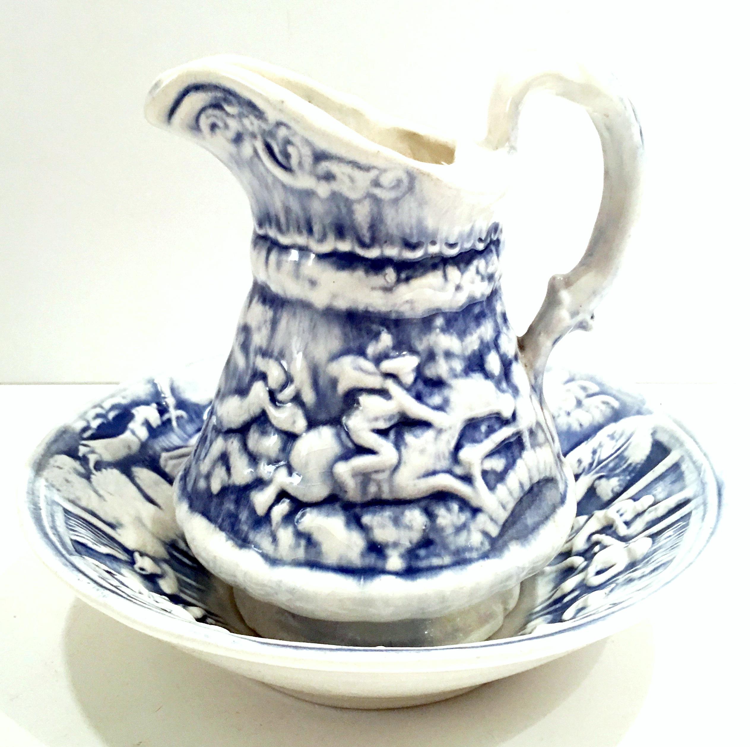 Vintage ceramic blue and white repose pitcher and basin, two-piece set. The repose pattern of tavern and witches scene is based on a poem by Robert Burns, 1790, entitled 