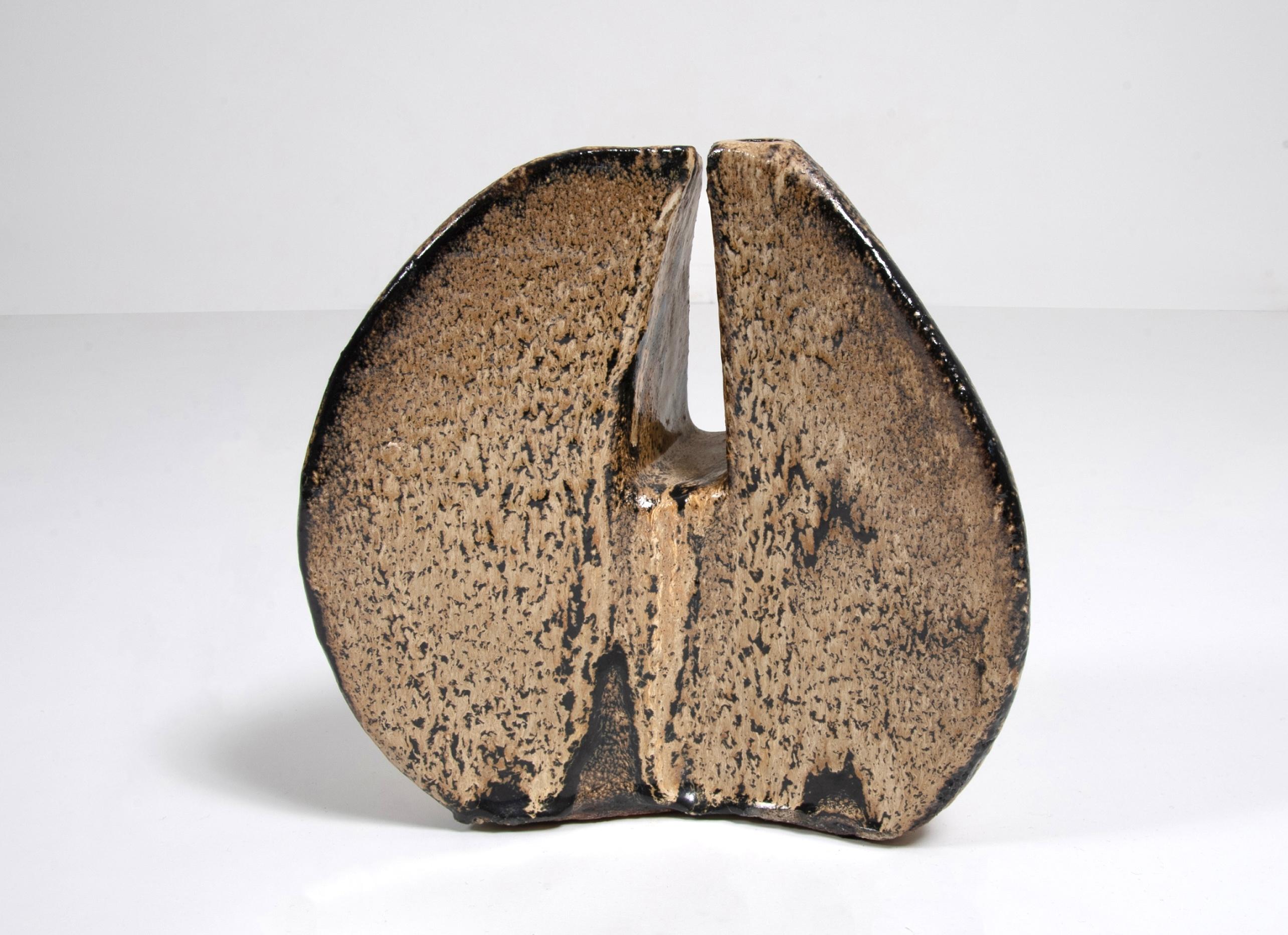 Glazed stoneware vase by Andrée & Michel Hirlet.
Material: Stoneware, glazing.
Dimensions: H 42 x 27 cm.
Year: circa 1970.
Unique piece, signed.

Working outside of any wider artistic community or movement, and through intuitive collaboration, the