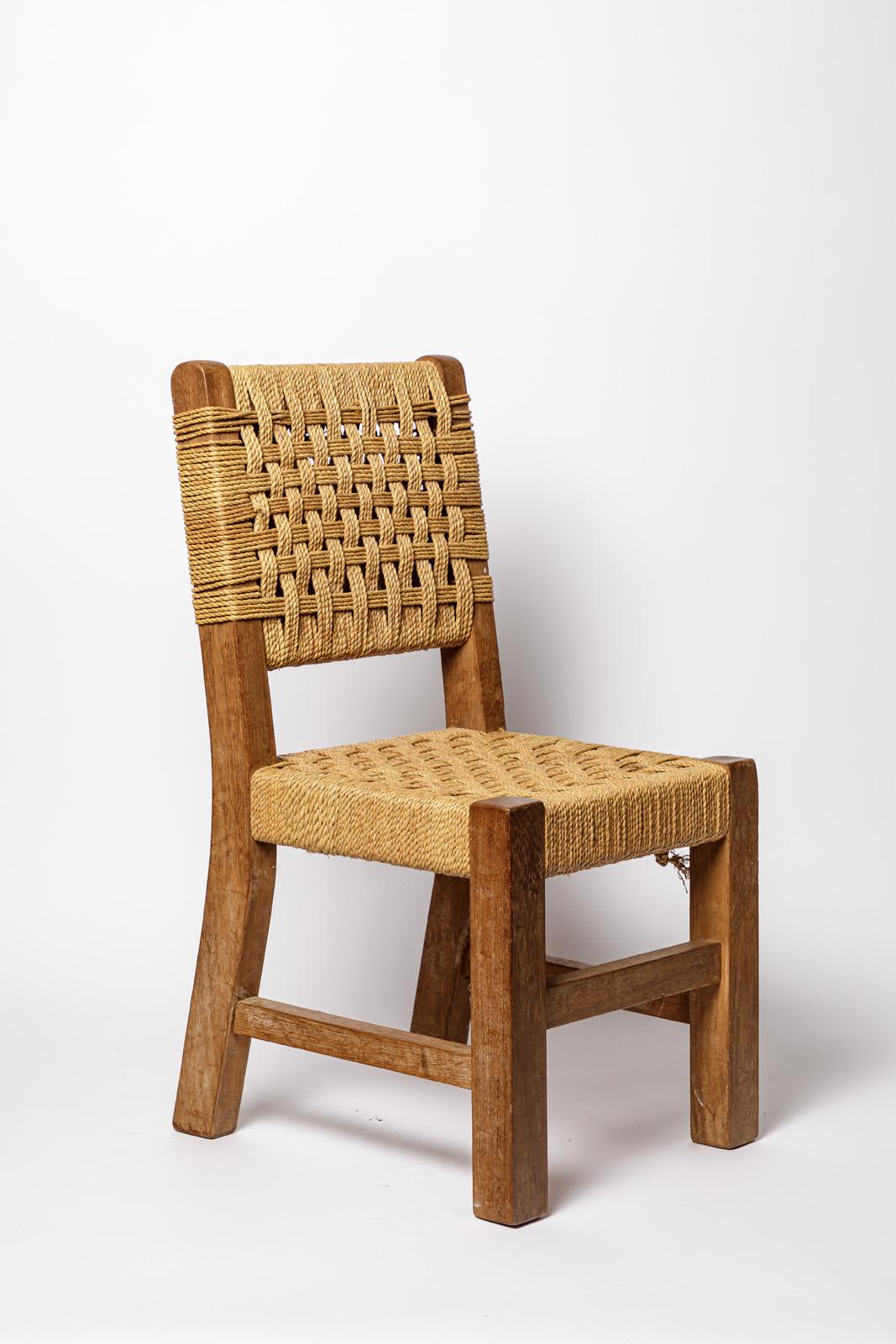 French 20th century children wood and cord design chair style of AUdoux Minnet design For Sale