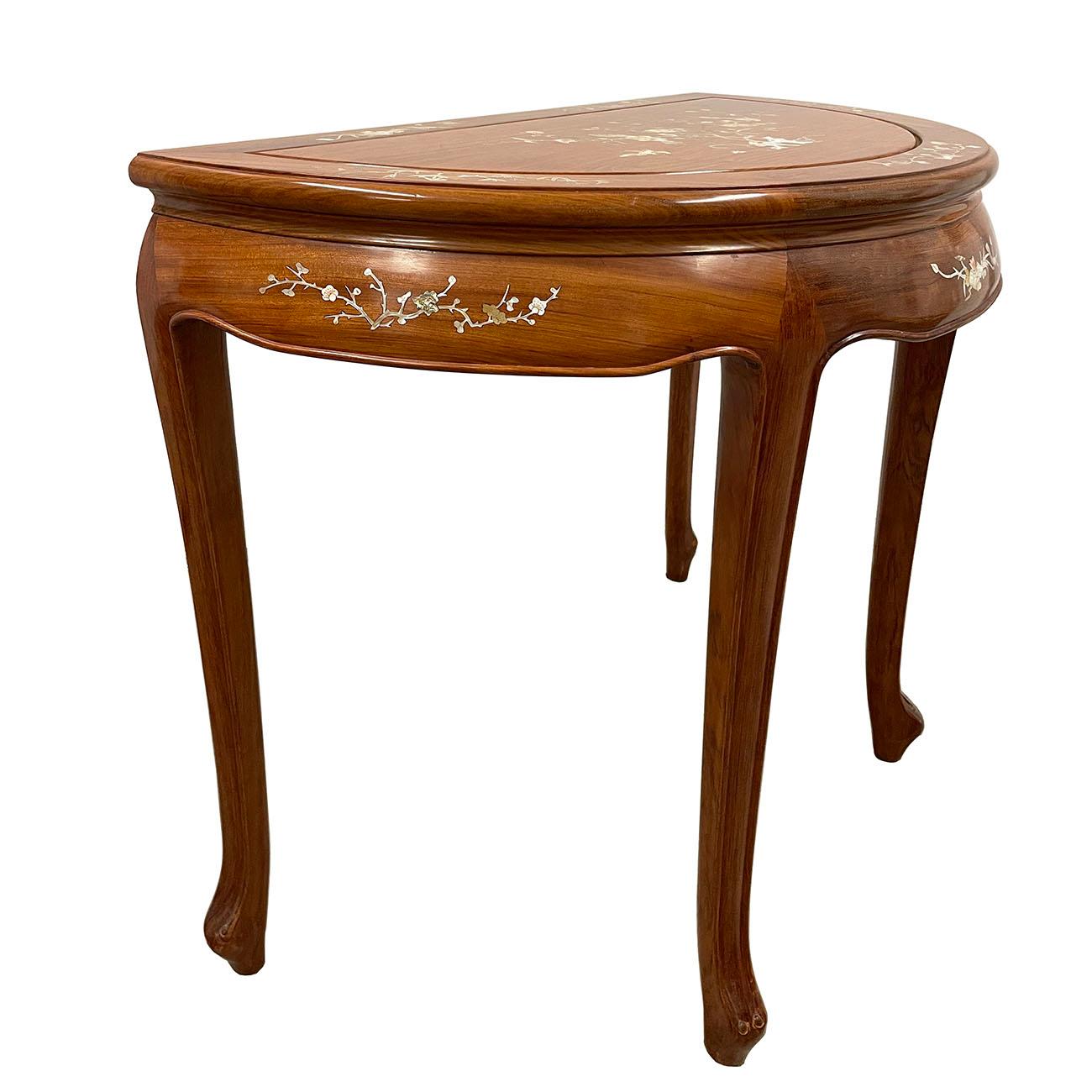 This gorgeous Chinese Antique carved half moon table is made from solid HuaLi wood with beautiful traditional Mother of pearl inlay of birds and floral design on top and around table. This tables has traditional curve design on the wrist and legs.