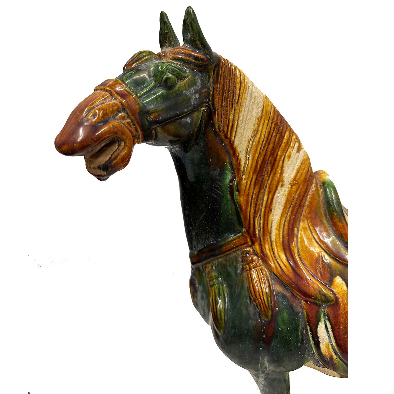 A large vintage Tang style Sancai glazed terracotta horse. This exquisite piece features a striking green and brown color glazed finish, infusing it with a touch of classic allure.
The production process of Tang Sancai is very complicated. First of