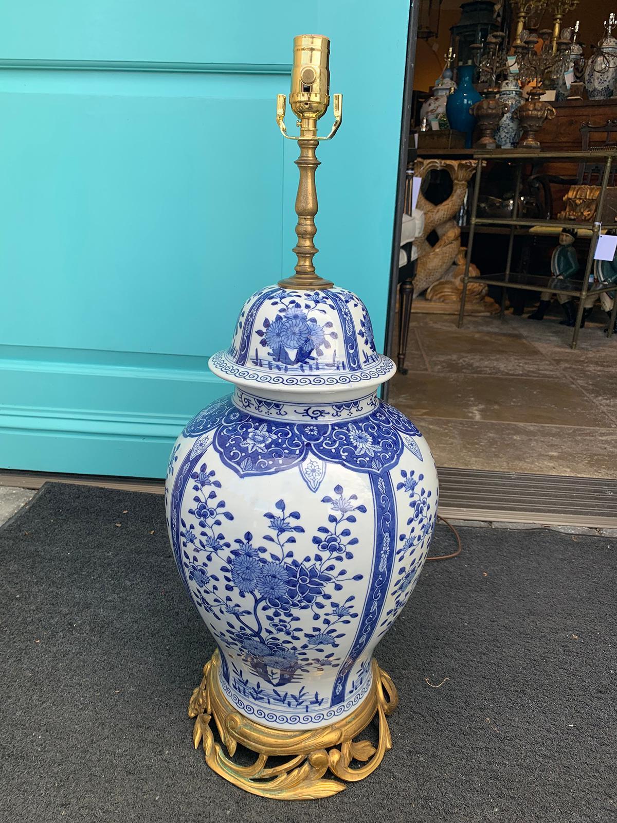 20th century Chinese delft style blue and white bronze mounted lamp.
Brand new wiring.
