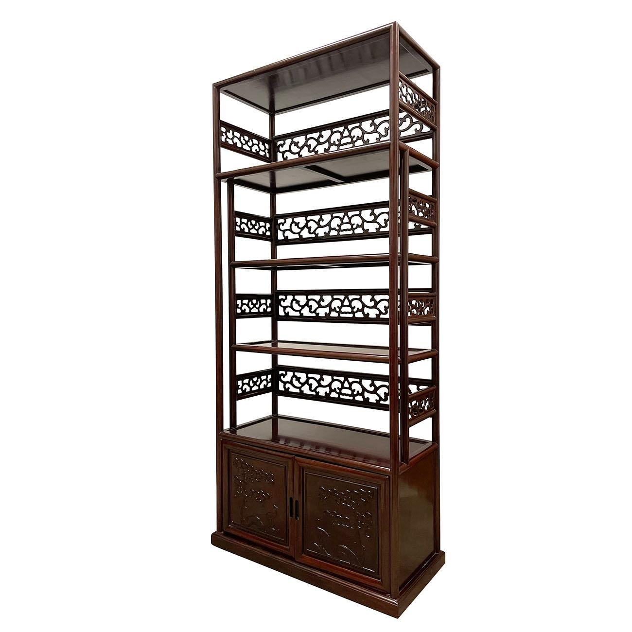 This wonderful Chinese Vintage hand carved Book Shelf was made from solid hardwood in about 1950's. You may easily see from the pictures that It is still in its original condition. It is featured 4 layers shelves on the top and double open doors
