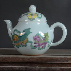 20th Century Chinese Handmade Porcelain Teapot Featuring Lions Playing Balls