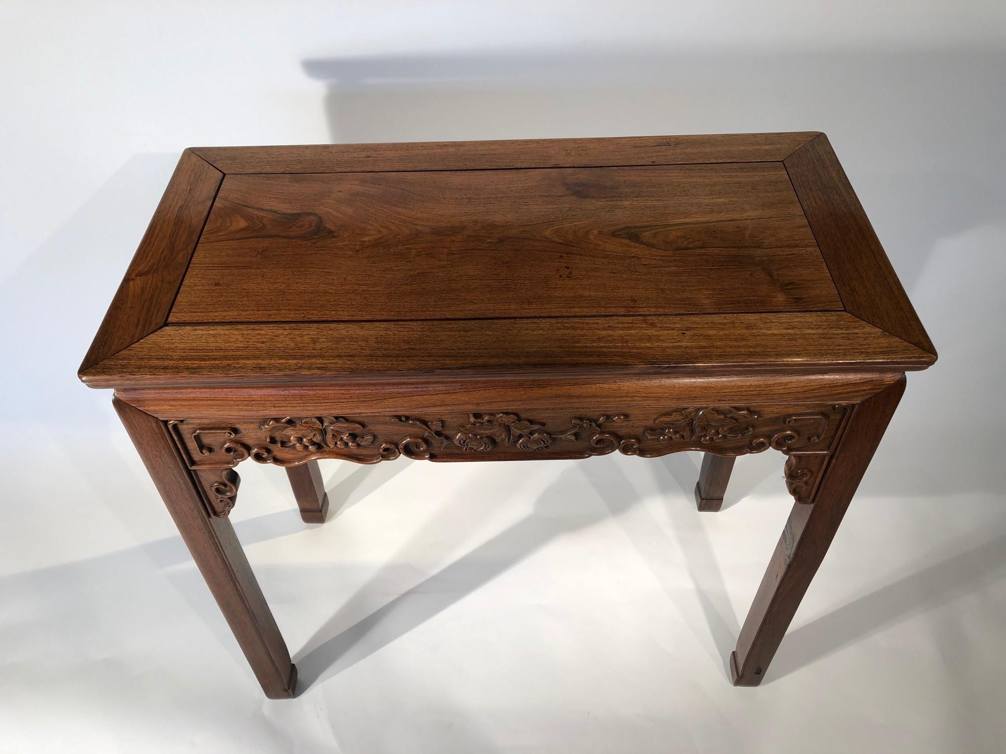 A fine quality Chinese hardwood altar table. The whole has an excellent faded color.