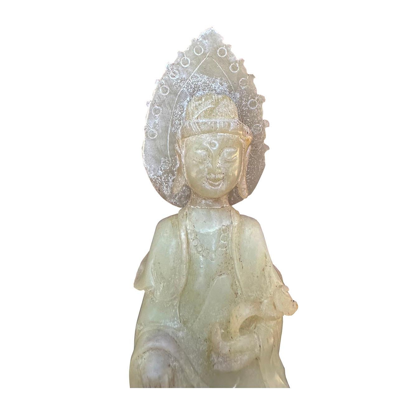 This magnificent Chinese hand carved Jade Kwan Yin Bodhisattva statuary shows very detailed hand carving works on it. It is all hand made and hand carved Kwan Yin sitting on the lotus seat and holding the Ru Yi in her hand with the gesture of Pudu