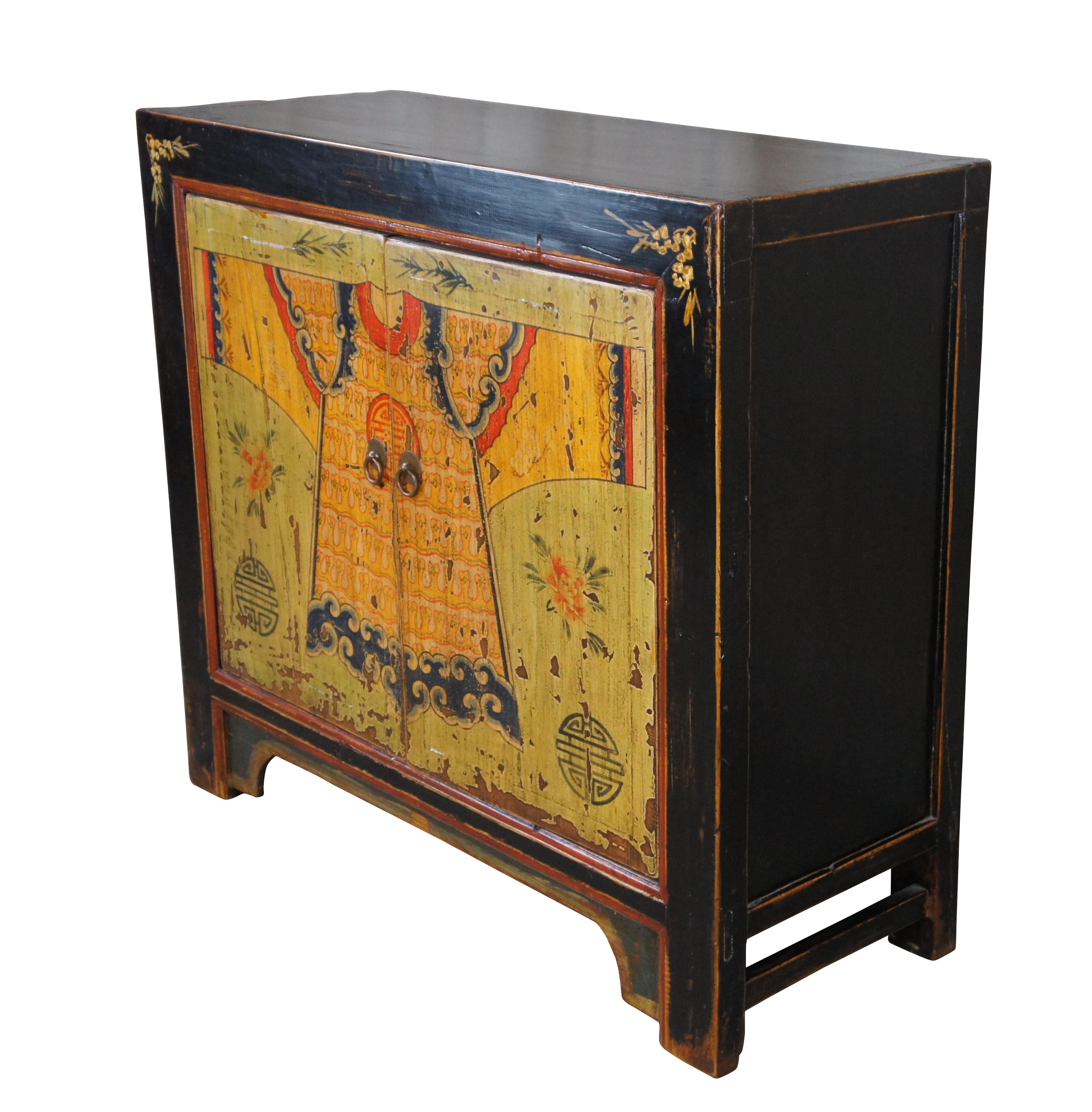 Chinese lacquered and painted two door chest. Features a rectangular frame made from Elm in Beijing. Constructed via centuries old mortise and ten design. The front of the chest showcases a painted motif with a traditional Changshan robe. Changshan