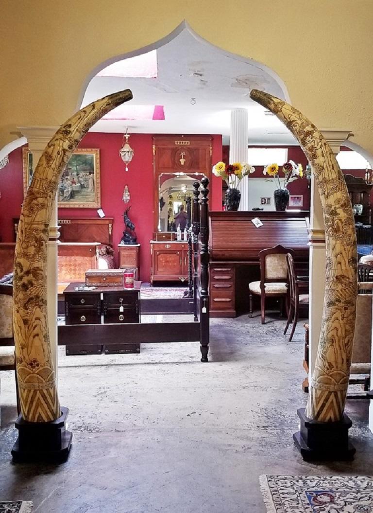 Before we start, you can relax, these are not real elephant tusks and are most definitely not made of ivory !!! These are 100% legal

These are 'faux' tusks, hand-carved sections of bone (probably Ox Bone) placed onto a wooden carcass in the shape