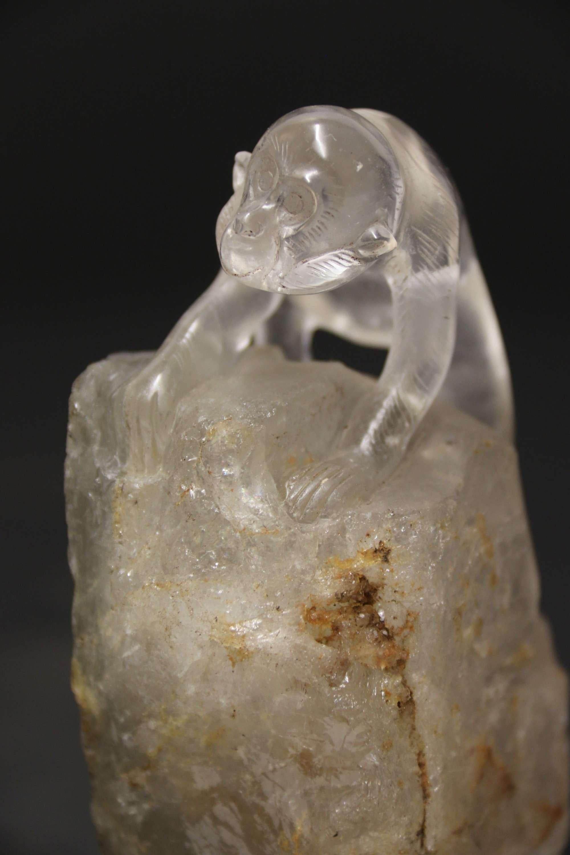 A superb Chinese quartz rock crystal study of a monkey.

This fine quality early 20th century Chinese quartz rock crystal study has been cleverly hand carved from a boulder stone and it depicts a detailed study of a monkey climbing on top of a