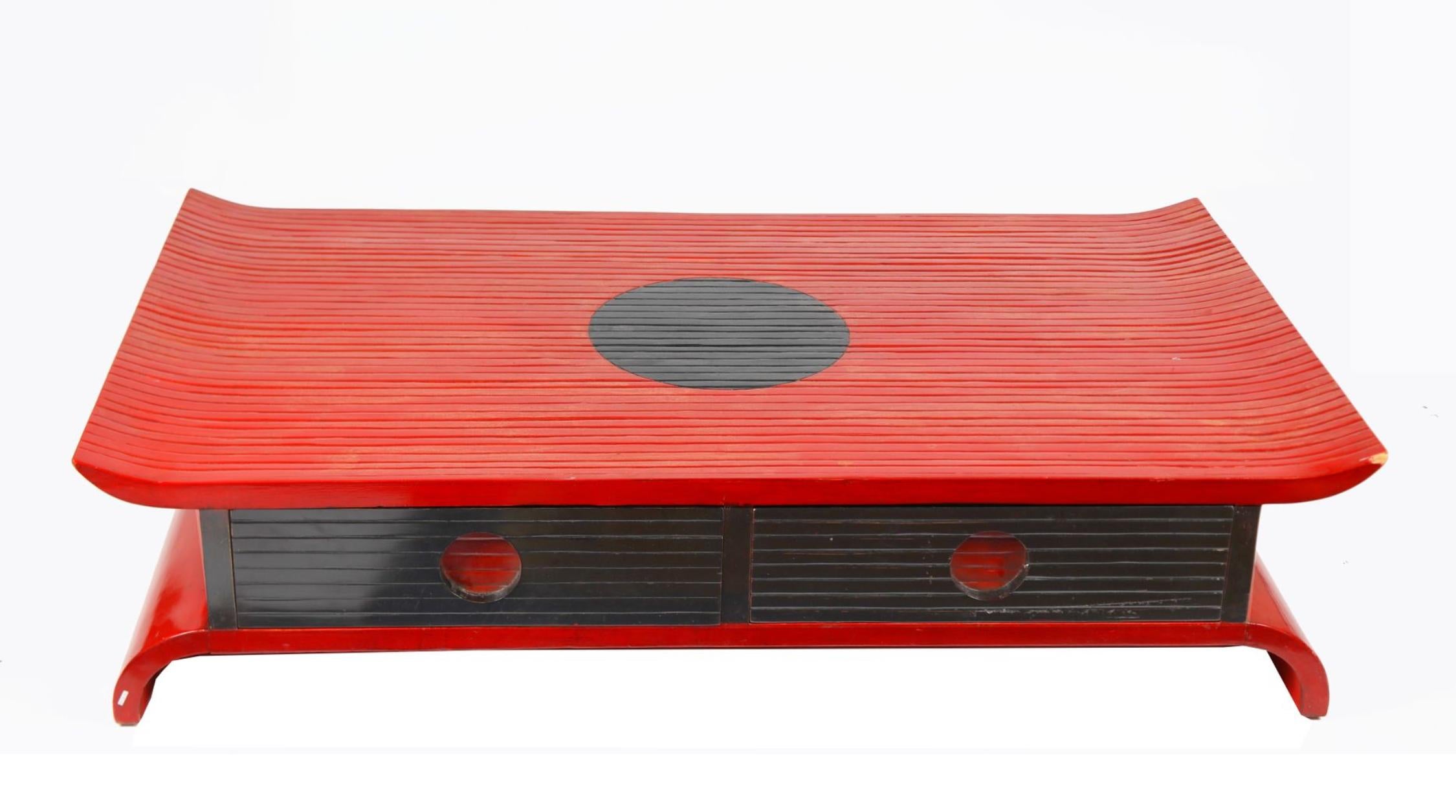 Red and black lacquer coffee table, opening with two drawers in Chinese style.
 
