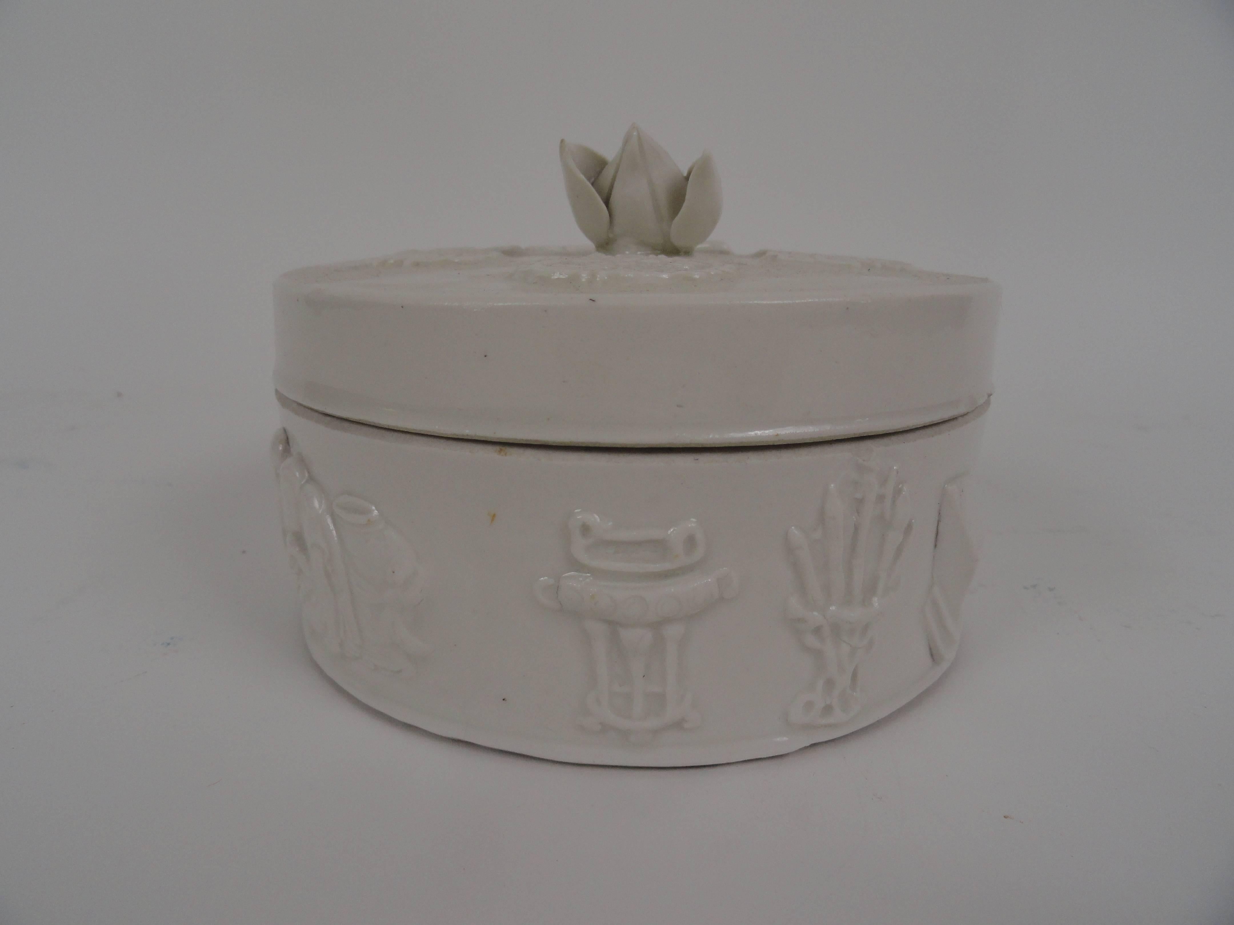 20th century, Chinese round ceramic box with removable lid which has a lotus flower on top. Stamped 