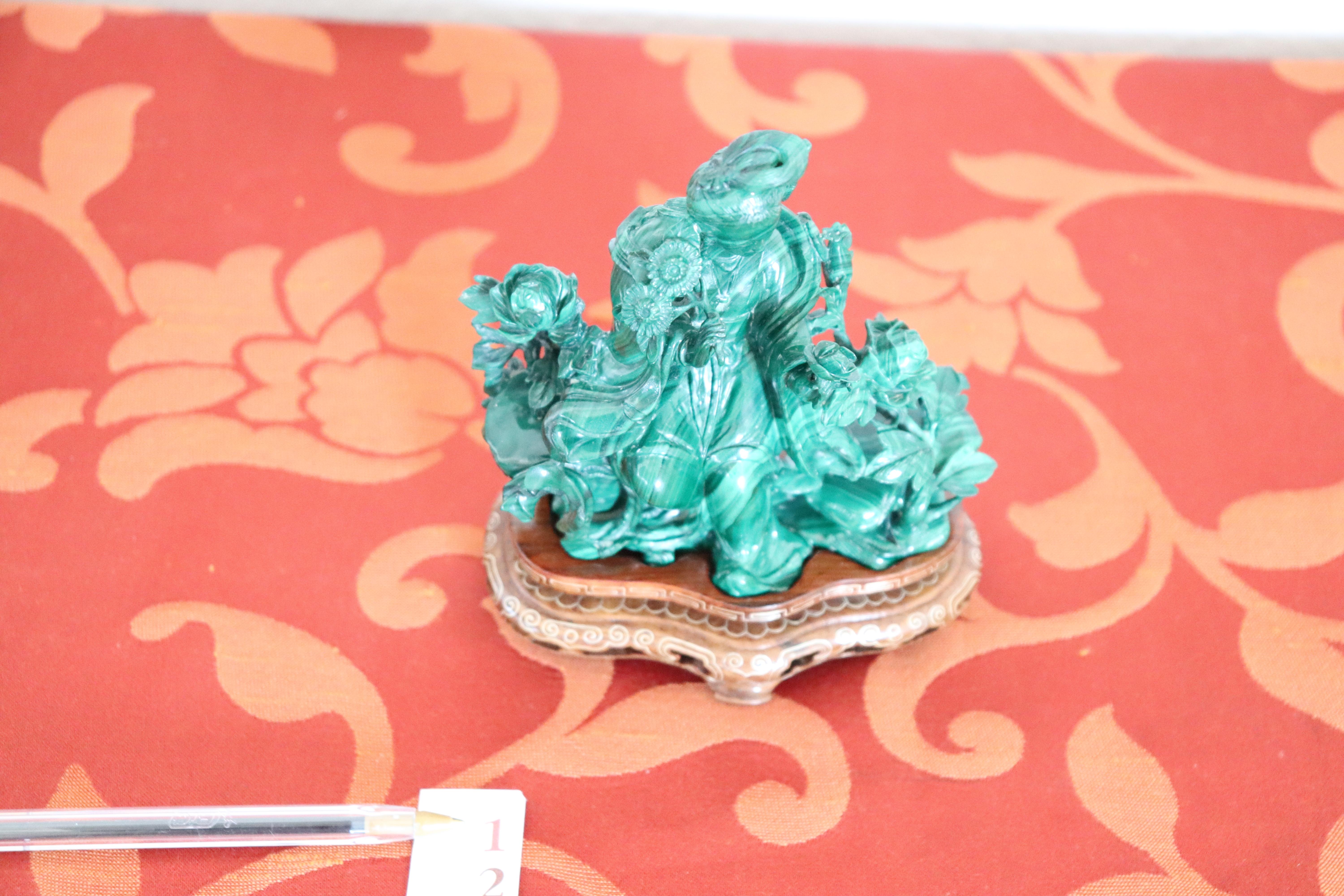 Beautiful sculpture in precious malachite made in china years 1930s. Fine figure of geisha on wooden base.