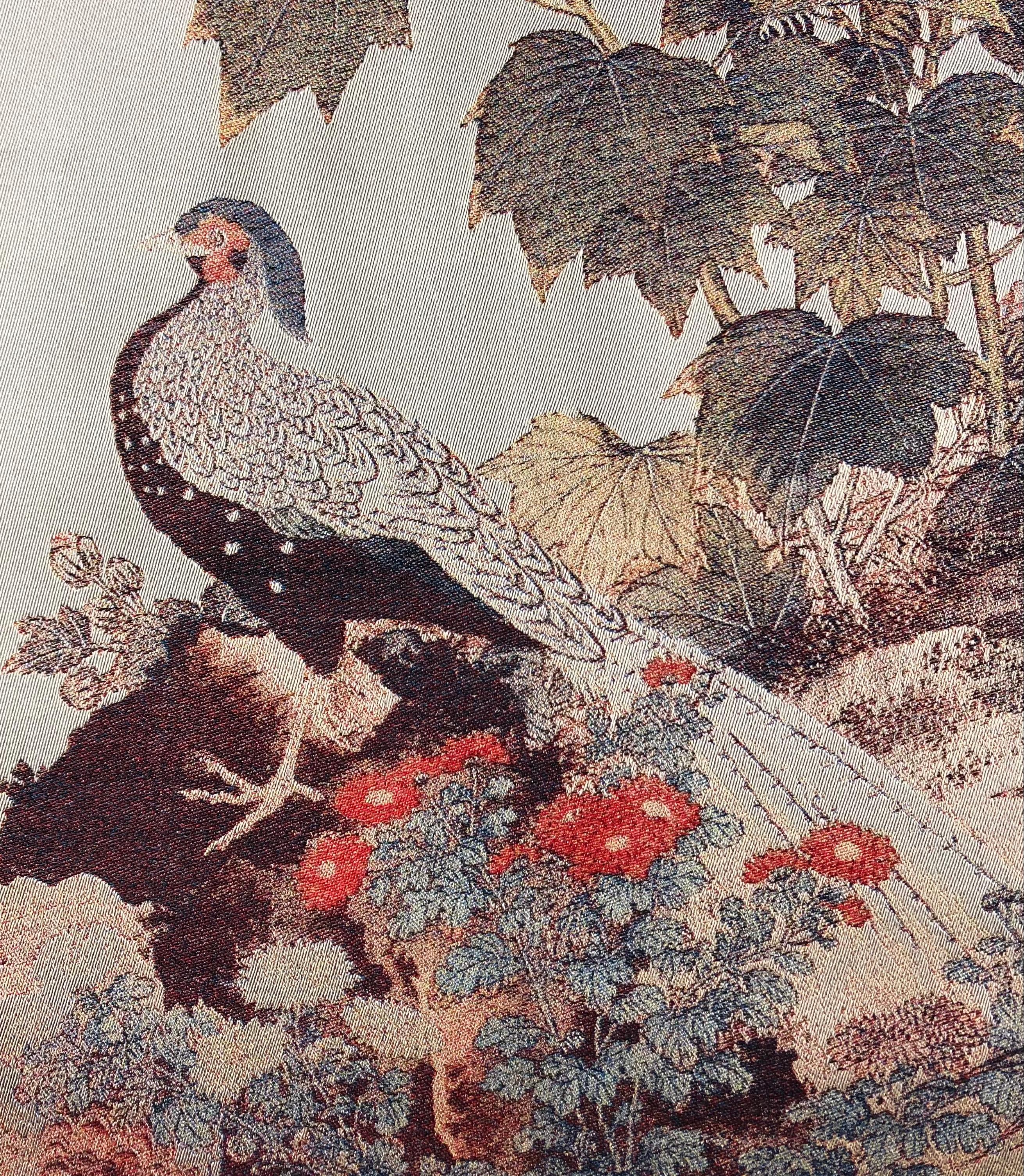 Beautiful Chinese silk scroll painting of a peacock surrounded by stunning foliage with calligraphy on the upper left side. 
Housed in its original interior gold lined blue silk covered box.
 
Measures: 42 7/8