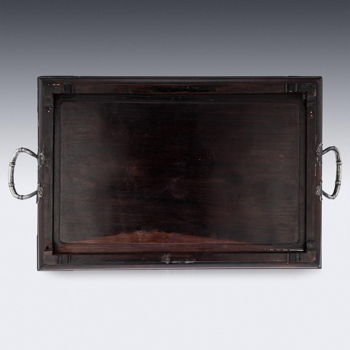 Antique early-20th century Chinese export solid silver impressively large tea tray, bamboo shaped handles and corner plaques chased with matted ground. Mounted on a large rosewood serving tray, of rectangular form, the surface is inlaid with silver