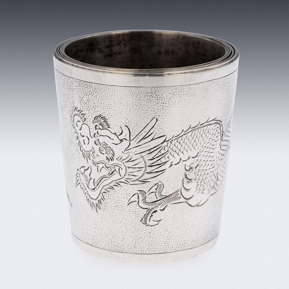 Antique 20th Century Chinese solid silver set of six stackable cased cups with leather pouch. The cups with a smooth top rim, a hand beaten hammer effect with a dragon which encircles the body. The underside of each cup is smooth and stamped with