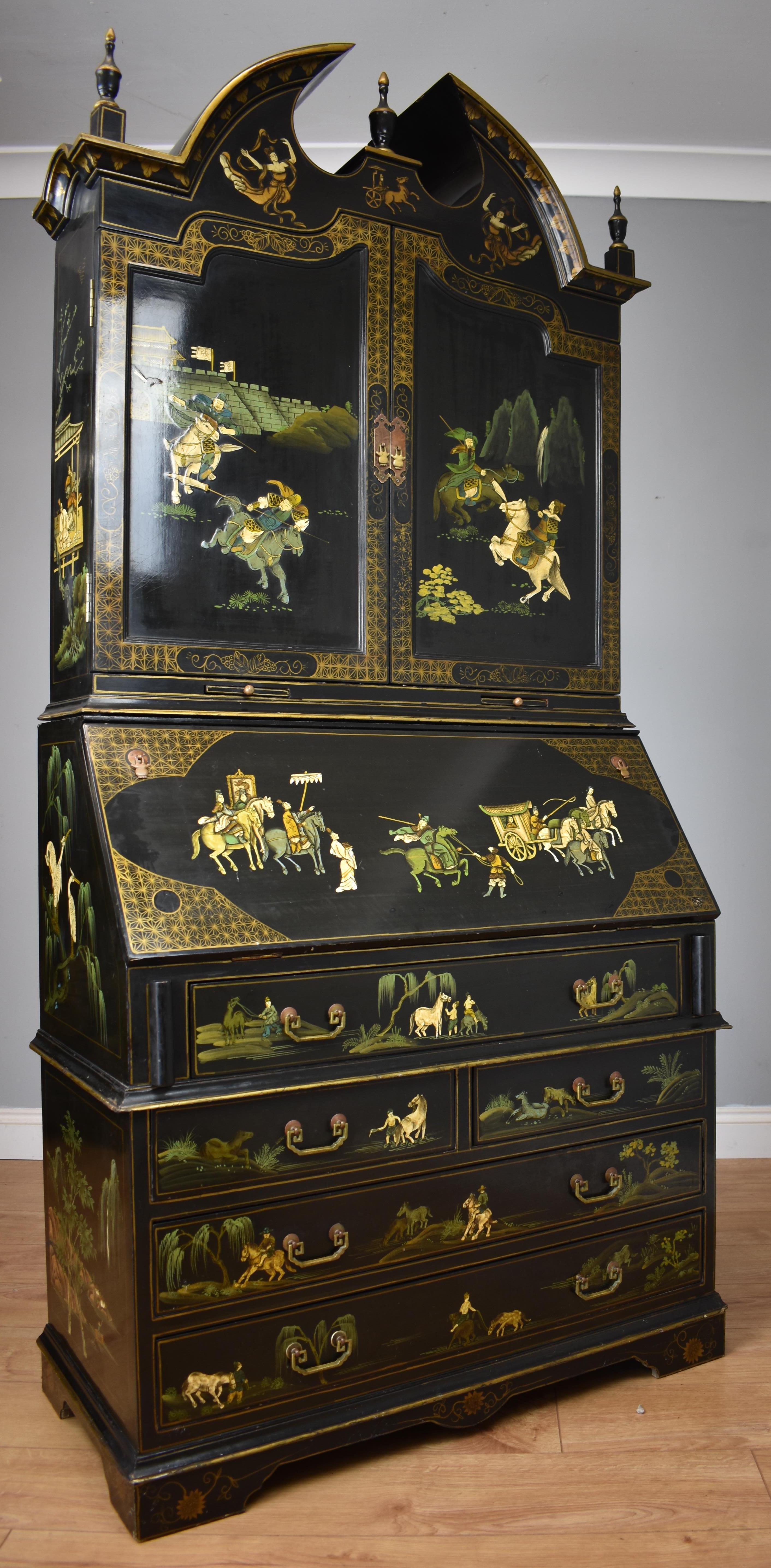 For sale is a good quality chinoiserie 20th century secretery bookcase with pediment top and detailed chinoiserie work to the top and base section front and sides. When the doors are opened it reveals a selection of drawers, pigeon holes and book