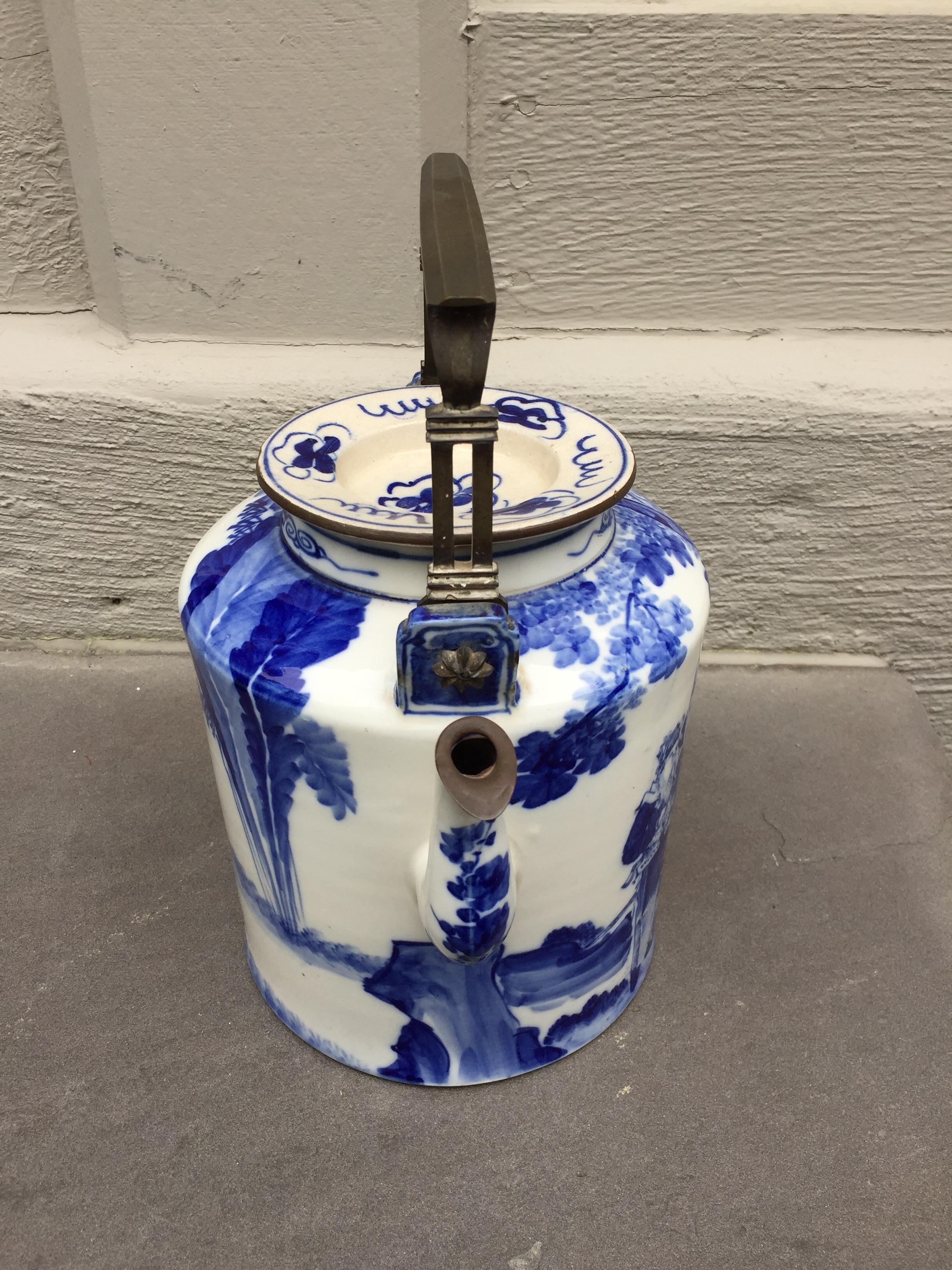 20th century chinoiserie Teapot brass handle and brass trim.
Beautiful hand painted, paneled ceramic teapot from China with beautiful lid
Hand painted characters
Brass handle and trim
chinoiserie brass teapot with lid
Measures: 10 x 8 x 12.