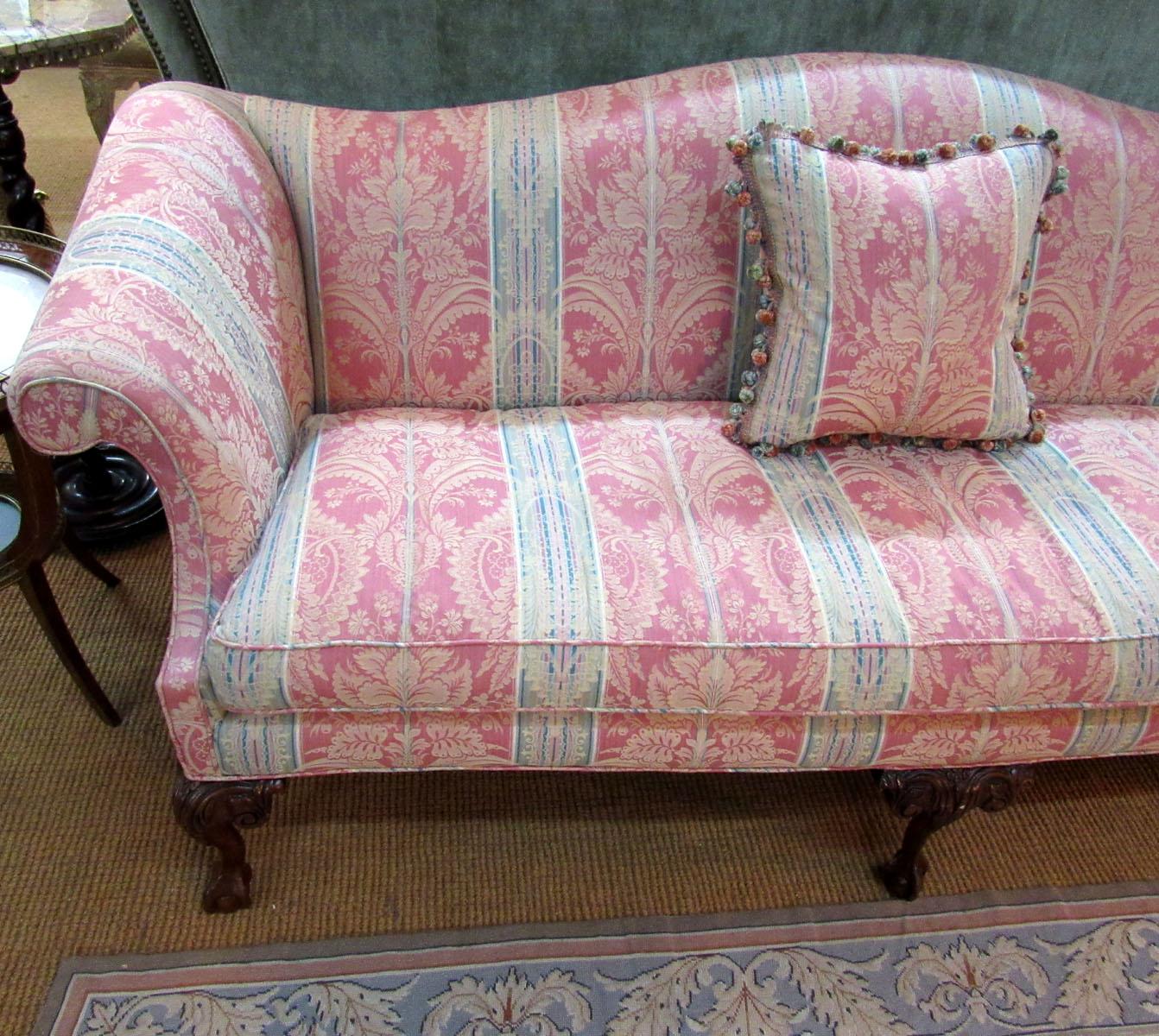 American Chippendale style camelback sofa with ball and claw feet of mahogany, by Southwood of North Carolina.