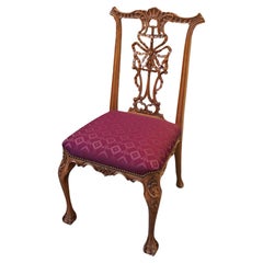 20th Century Chippendale Style Varnished Carved Pine Ribbon-Back Side Chair