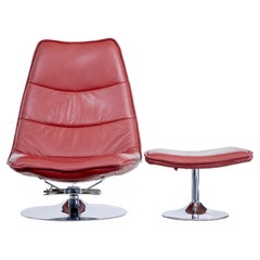 Retro 20th century chrome and leather chair with stool