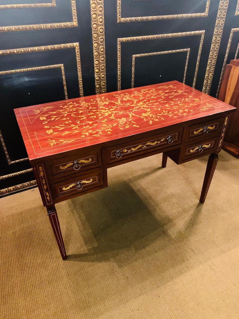20th century Classic desk in the style of classicism. wood and cherry veneer inlays.
 Longitudinal rectangular table top with five drawers, cut-out frame for legroom and square legs tapering downwards. Nice patina, hand polish with shellac. 


 