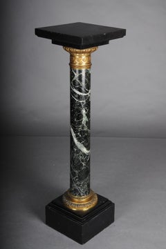 20th Century Classic French marble column, black with gold brass.