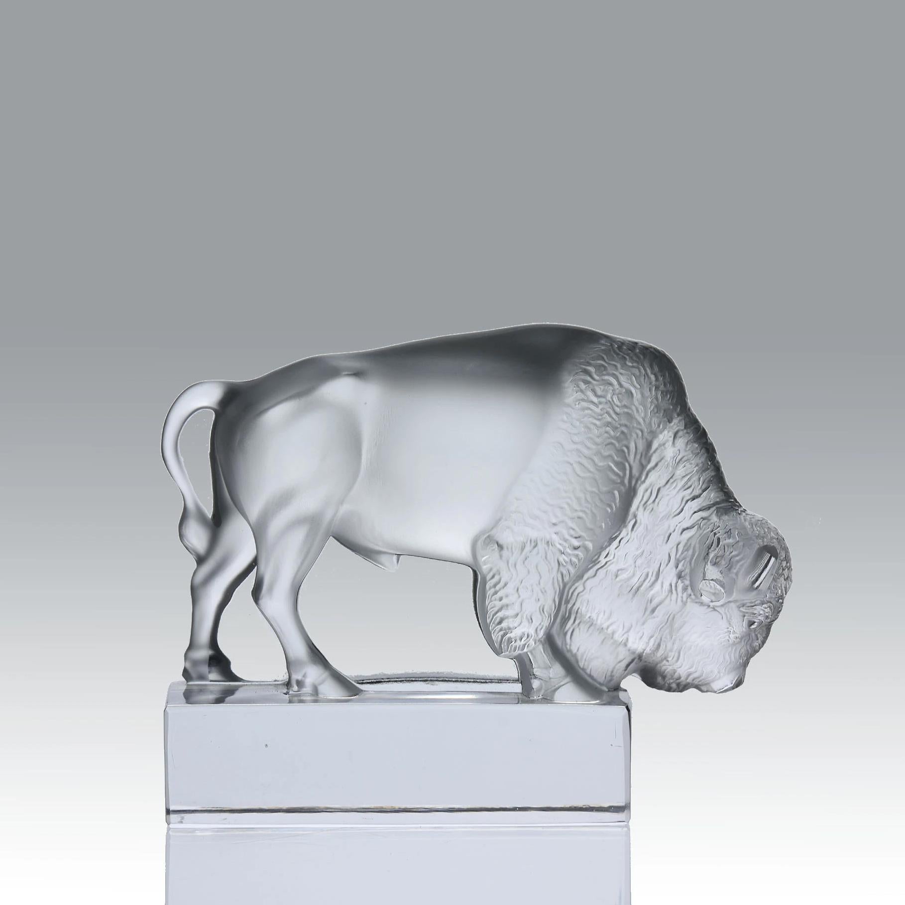 An impressive clear and frosted glass paperweight in the form of a grazing bison with excellent hand finished detail, signed Lalique France

ADDITIONAL INFORMATION

Height: 9.5 cm

Width: 12 cm

Condition: Excellent Condition

circa: