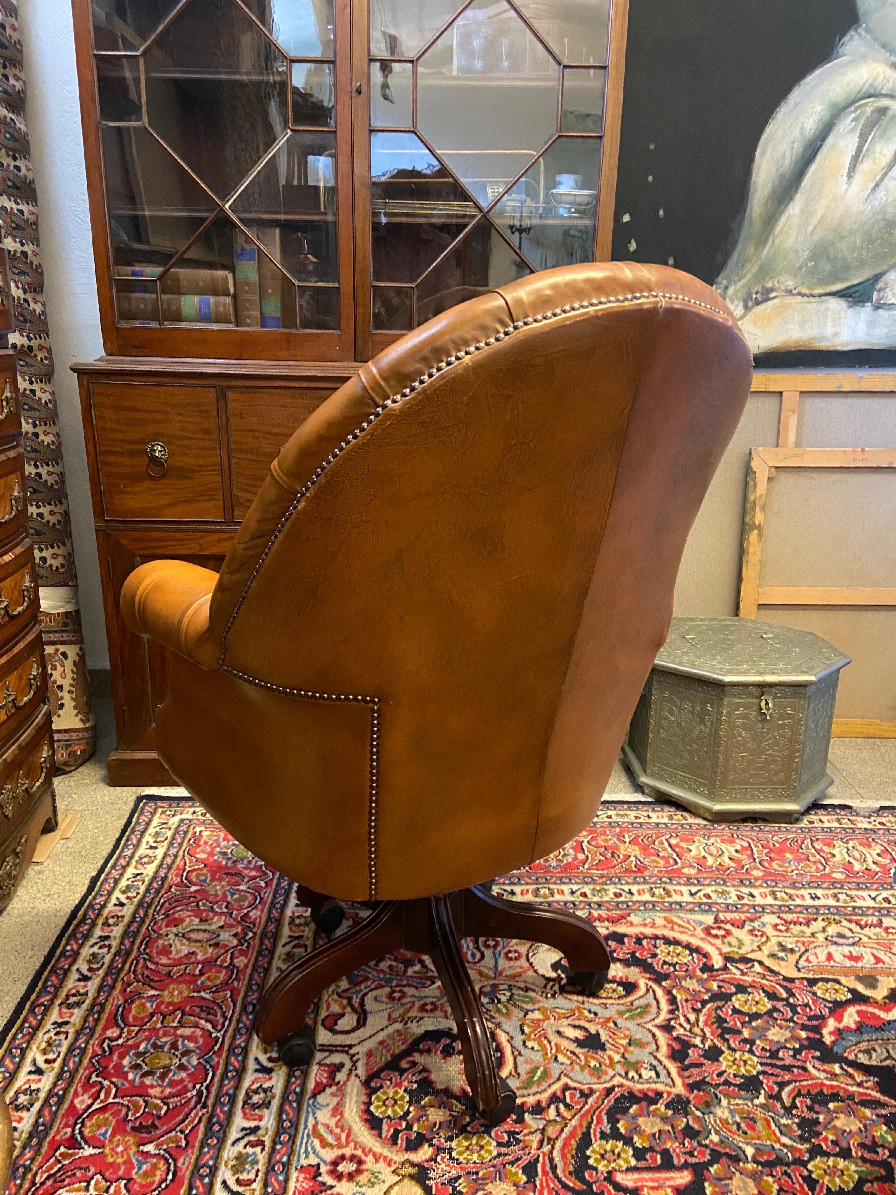leather chesterfield swivel chair