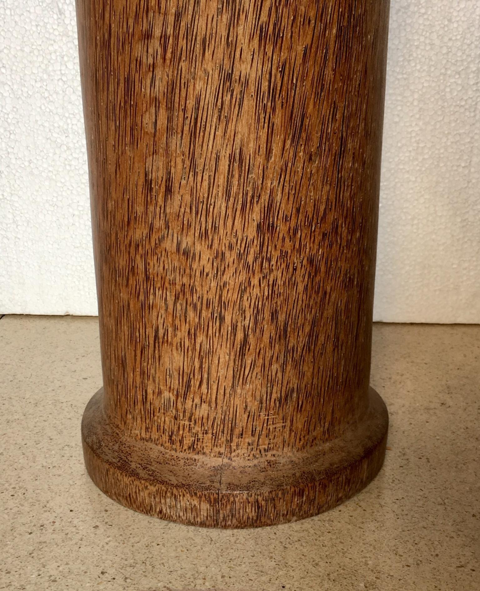 Column or pedestal handmade in coconut wood.