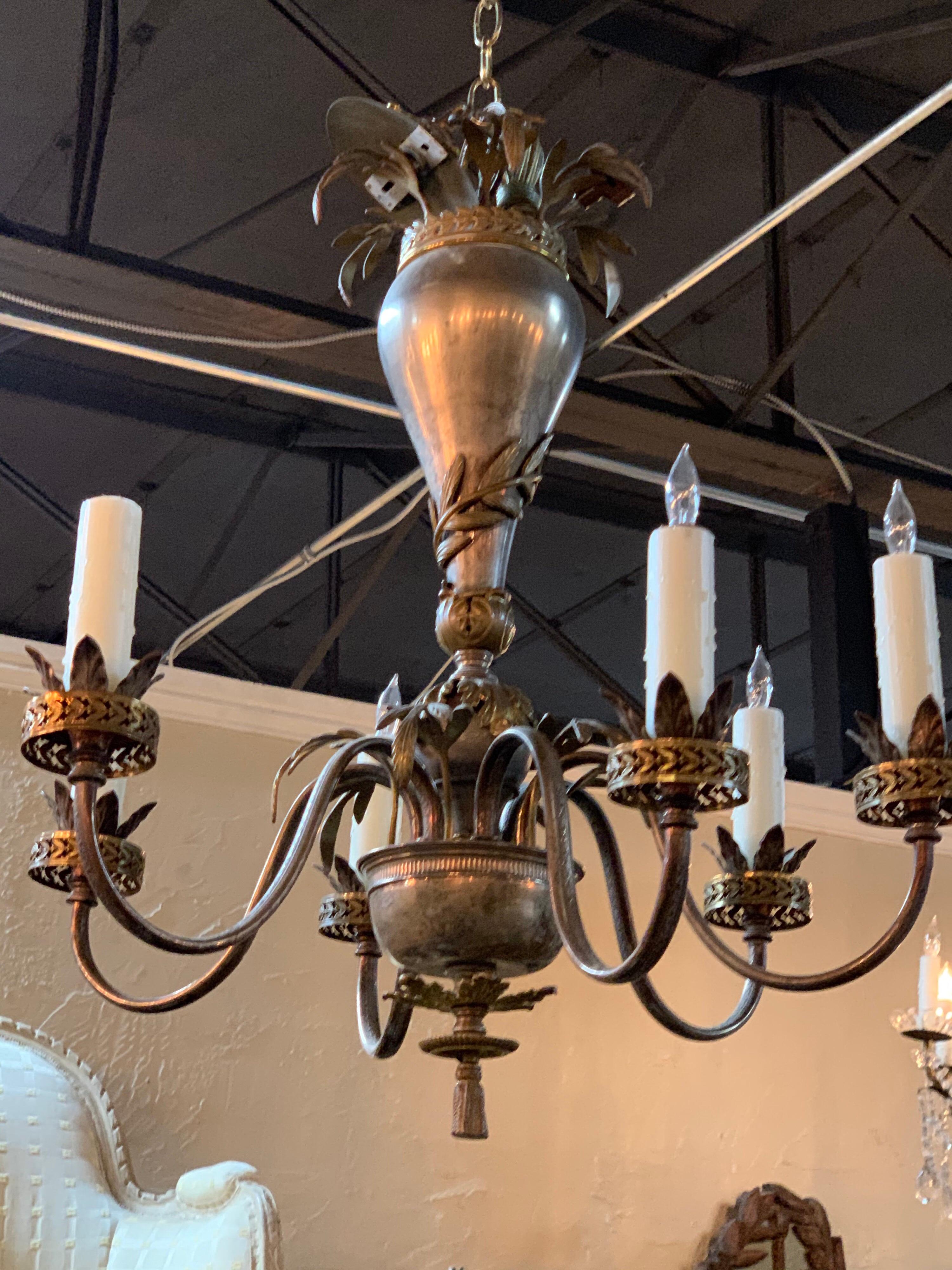 Very lovely 20th century Continental style silvered brass chandelier with 6 lights. Touches of gold remain on the decorative details. So pretty!