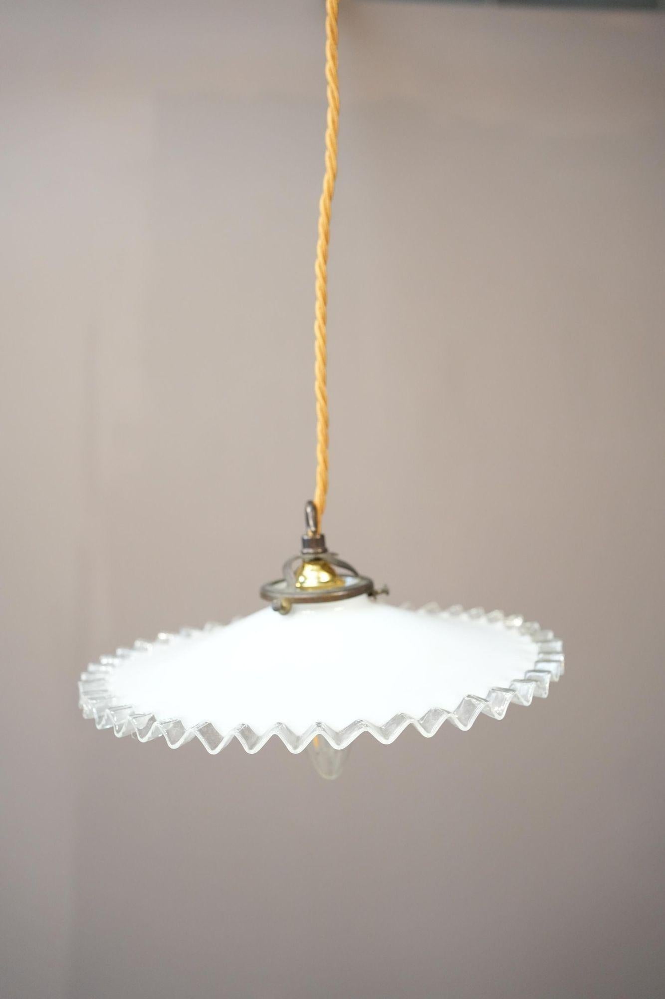 This is a very attractive crimped edge opaline light. Always popular and look great in a huge number of settings, in a run over a table or kitchen island, either side of a bed or in the corner of the room over a reading chair. Perfect condition and