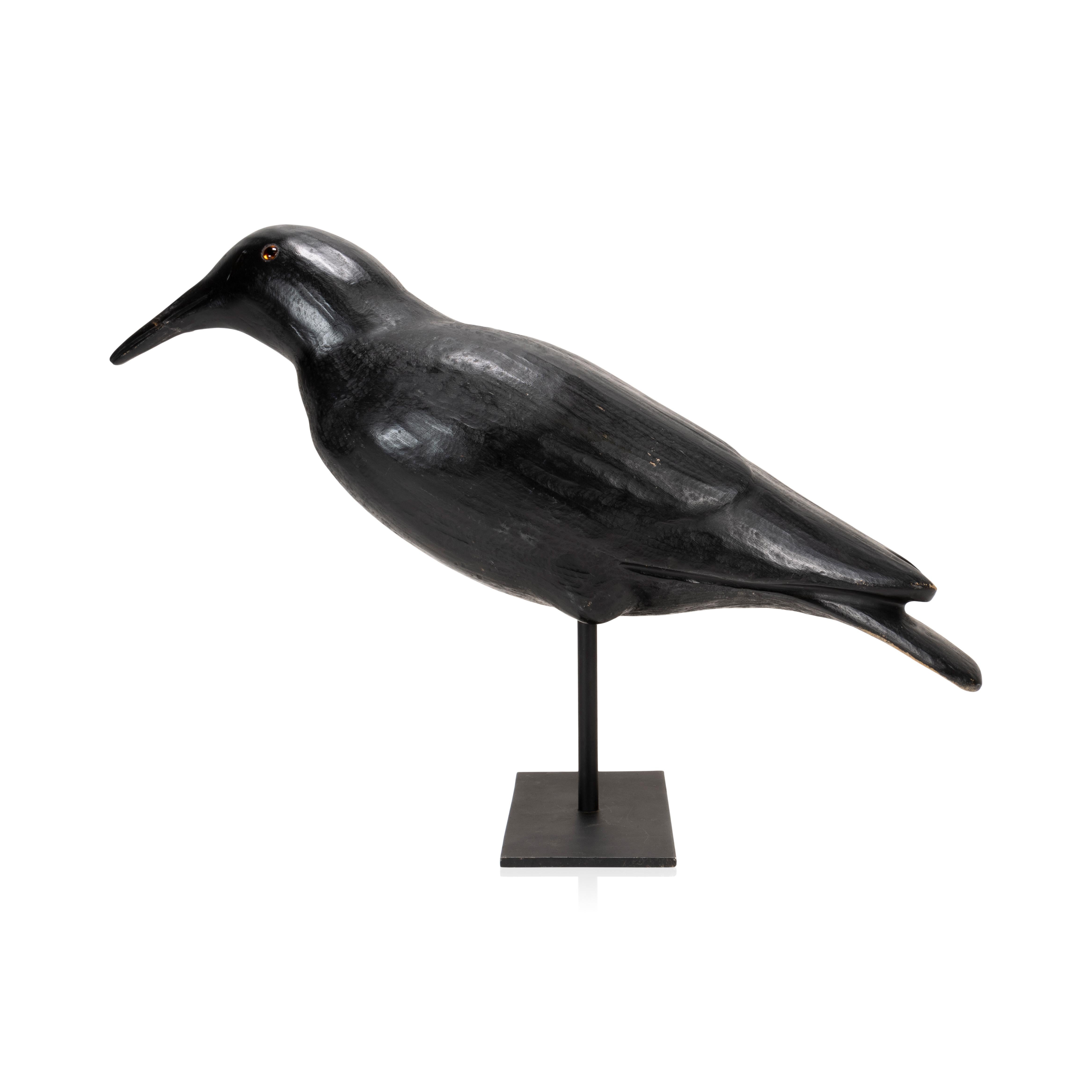20th Century Crow decoy. Carved and painted on metal base. Glass eyes. Carver unknown.

Period: 20th century
Origin: United States
Size: 18
