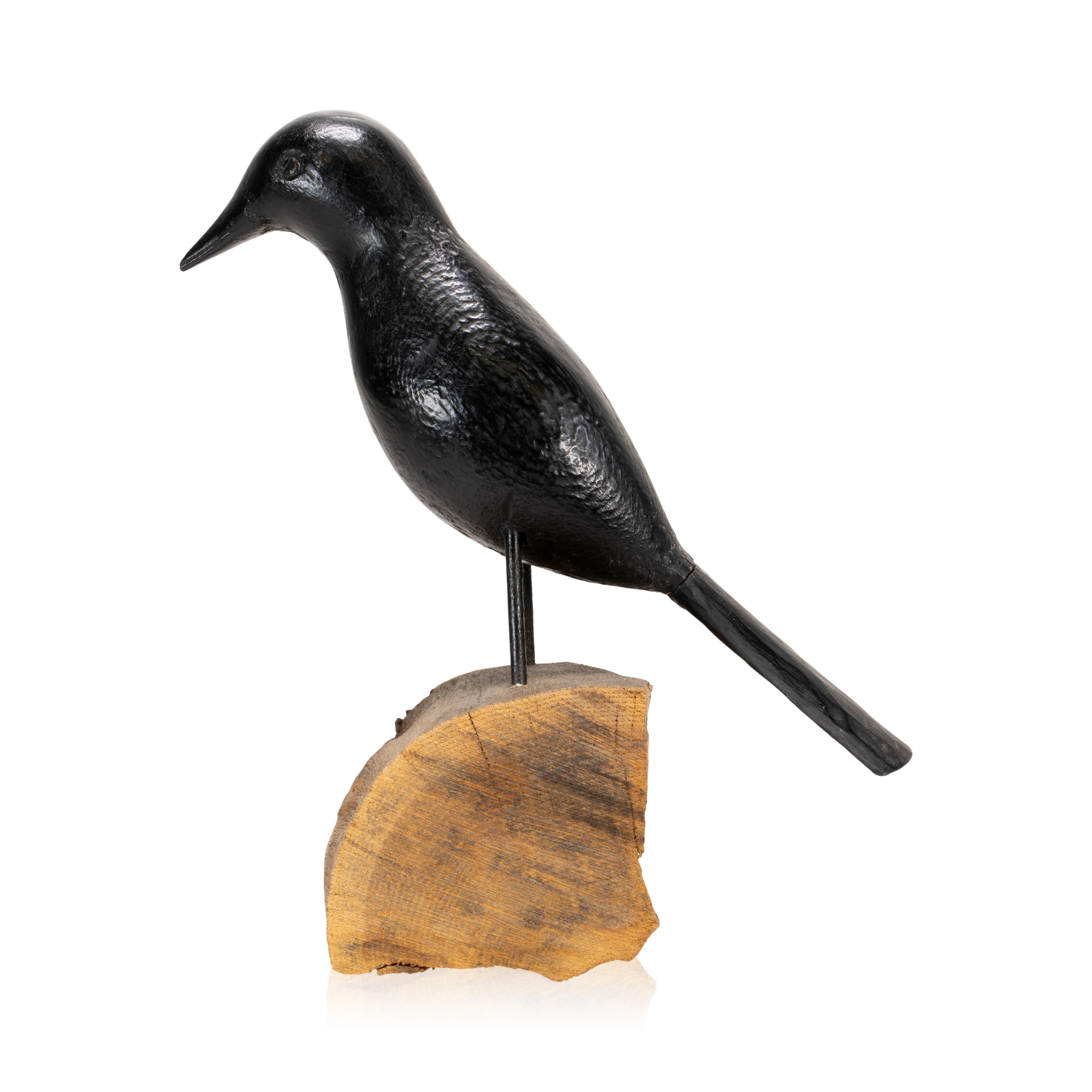 20th Century Crow decoy. Carved and painted on a wood base. Carver unknown

Period: 20th century
Origin: United States
Size: 13 1/4