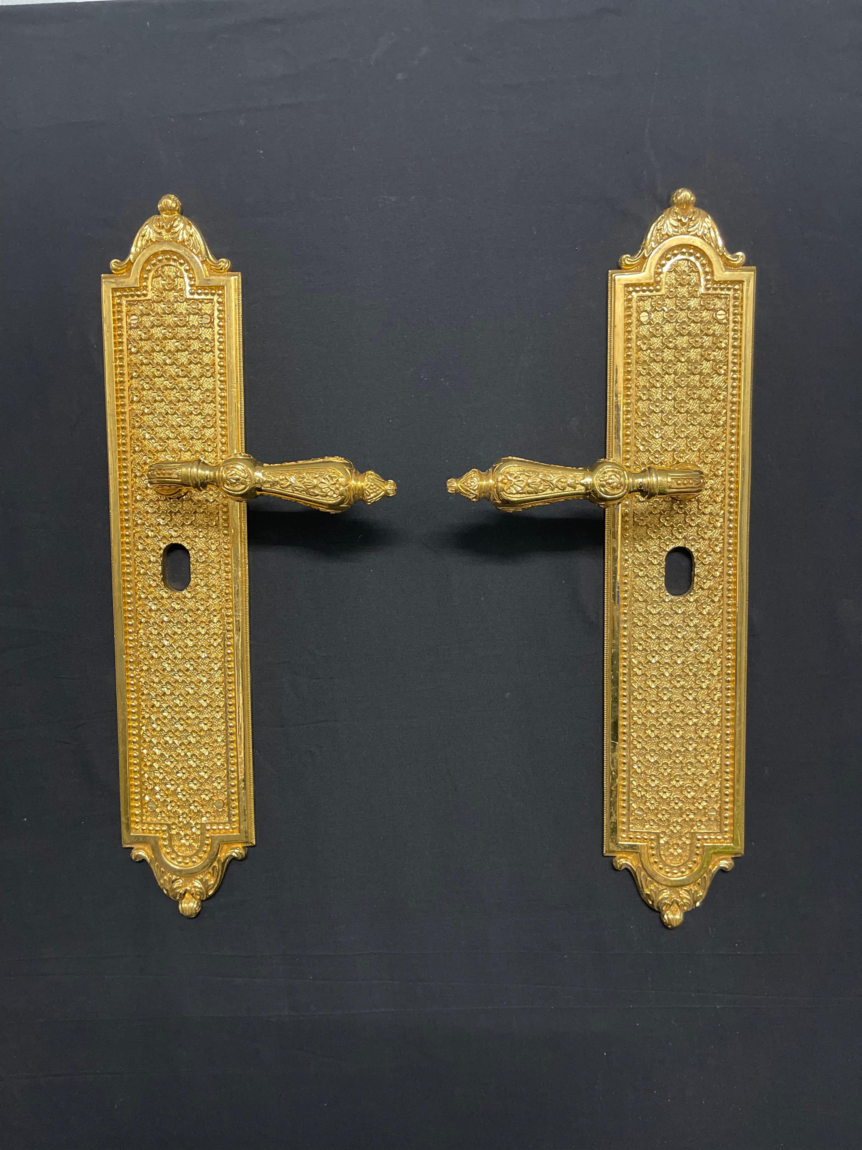 Unique custom made heavy 24k gold plated brass door handles are rare.
 
Exquisite and ornately detailed pairs of gold plated door handles these unique incredibly rare sets of door furniture originated from 45 Park Lane, Mayfair London the former