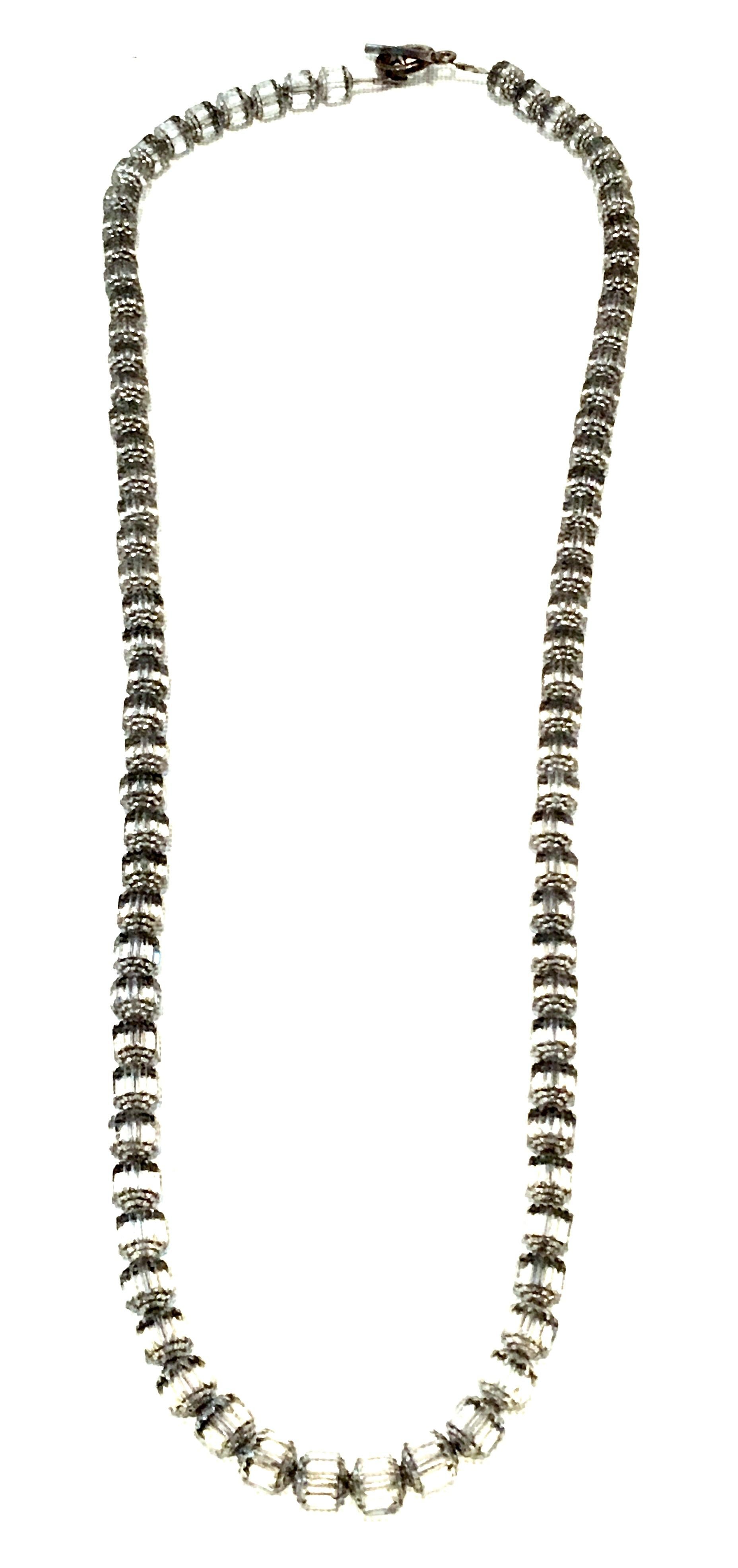 20th Century Cut Austrian Crystal & 925 Sterling Beaded Necklace. Features Austrian cut and faceted tubular smoked topaz crystal with grommet style rondelle's. Strung on 925 sterling wire with toggle style clasp. Clasp marked 925. Can be worn single