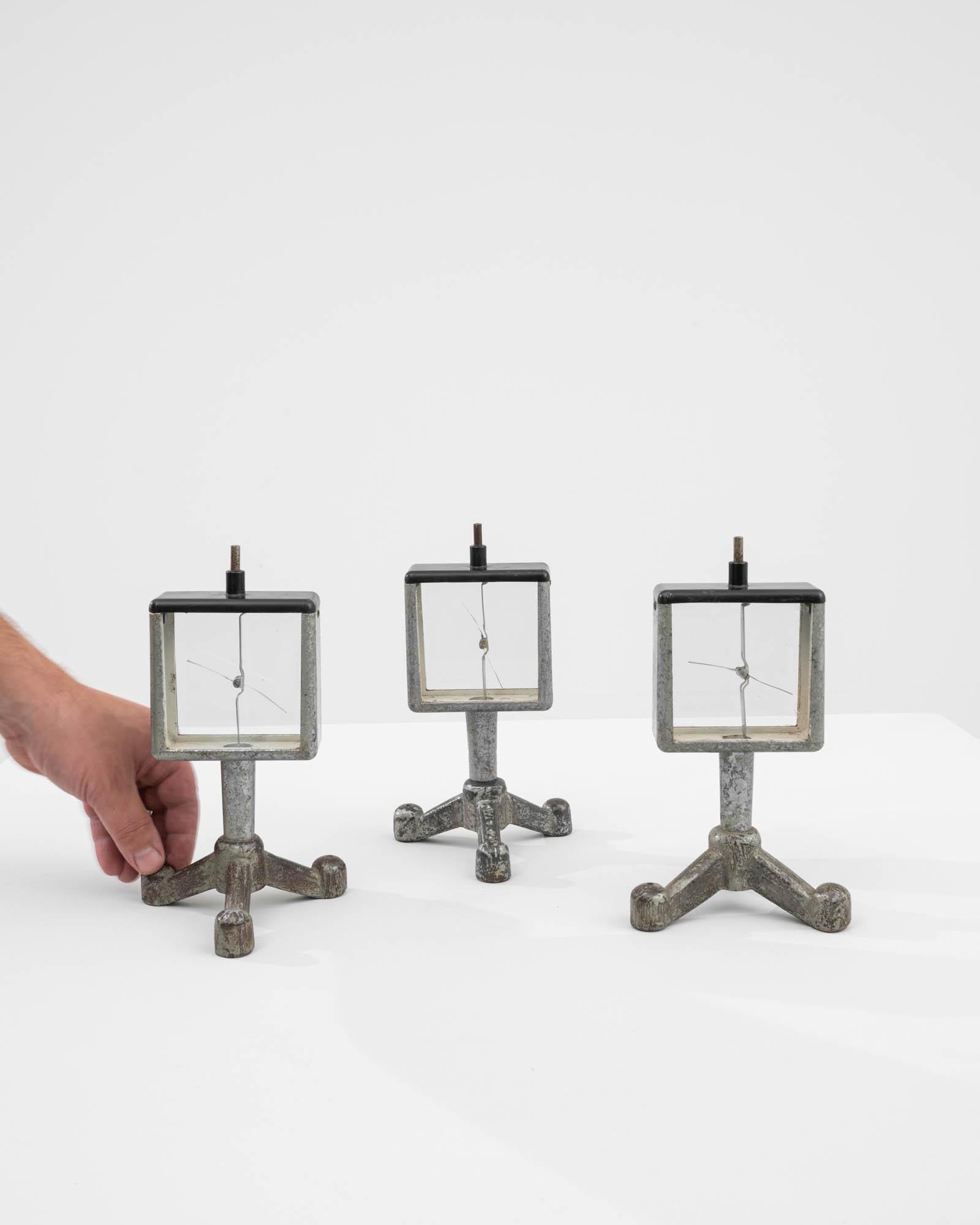 Step into the fascinating world of antique science with these 20th-century Czech Electroscopes. Each electroscope is a testament to the bygone era of scientific exploration. With a design that blends functionality and aesthetics, these instruments