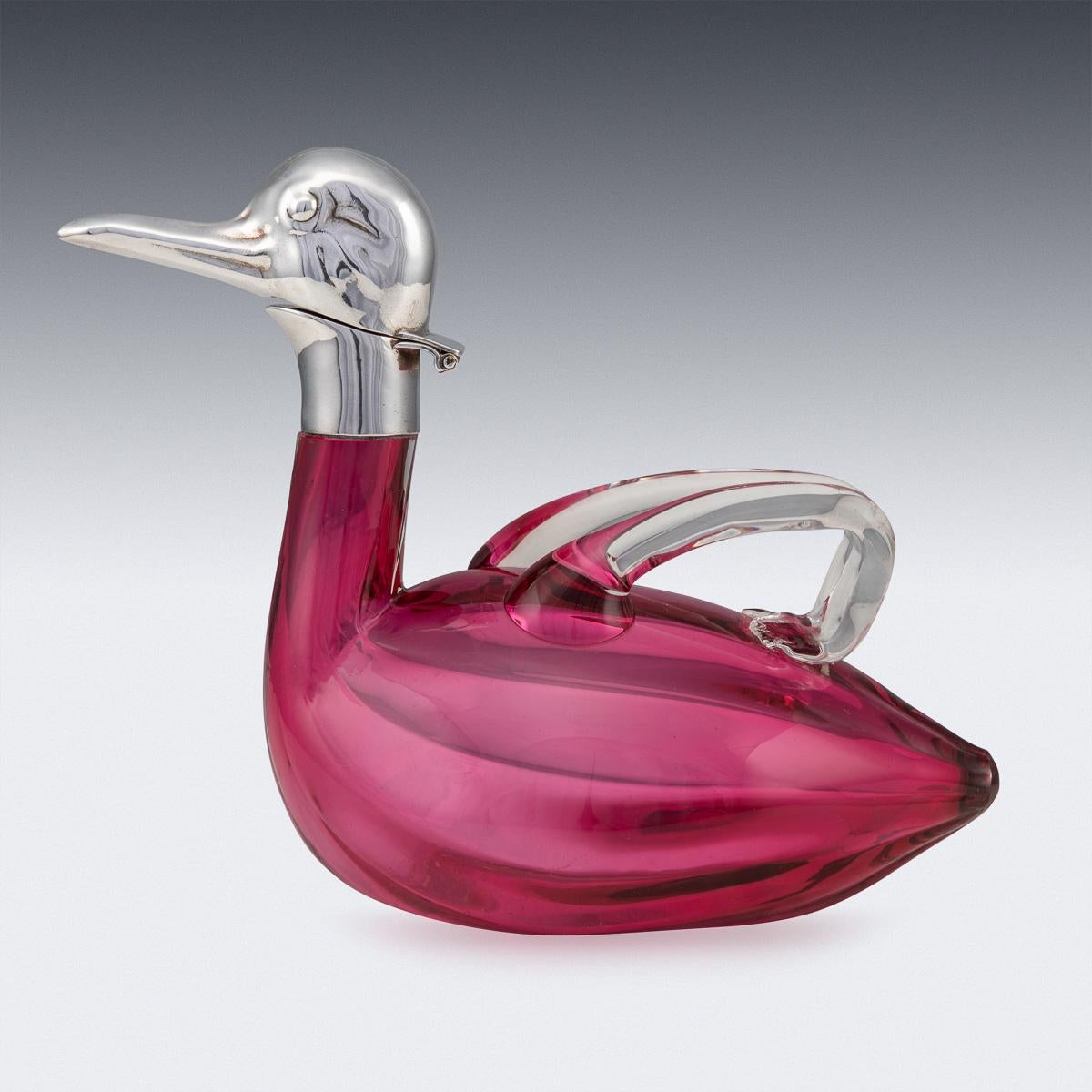 Antique mid-20th century Czechoslovakian silver plated mounted novelty claret jug modelled as a duck, pink glass body, the wings forming the handles, hinged head set with glass eyes, stamped Czechoslovakia. Such novelty claret jugs are rare and