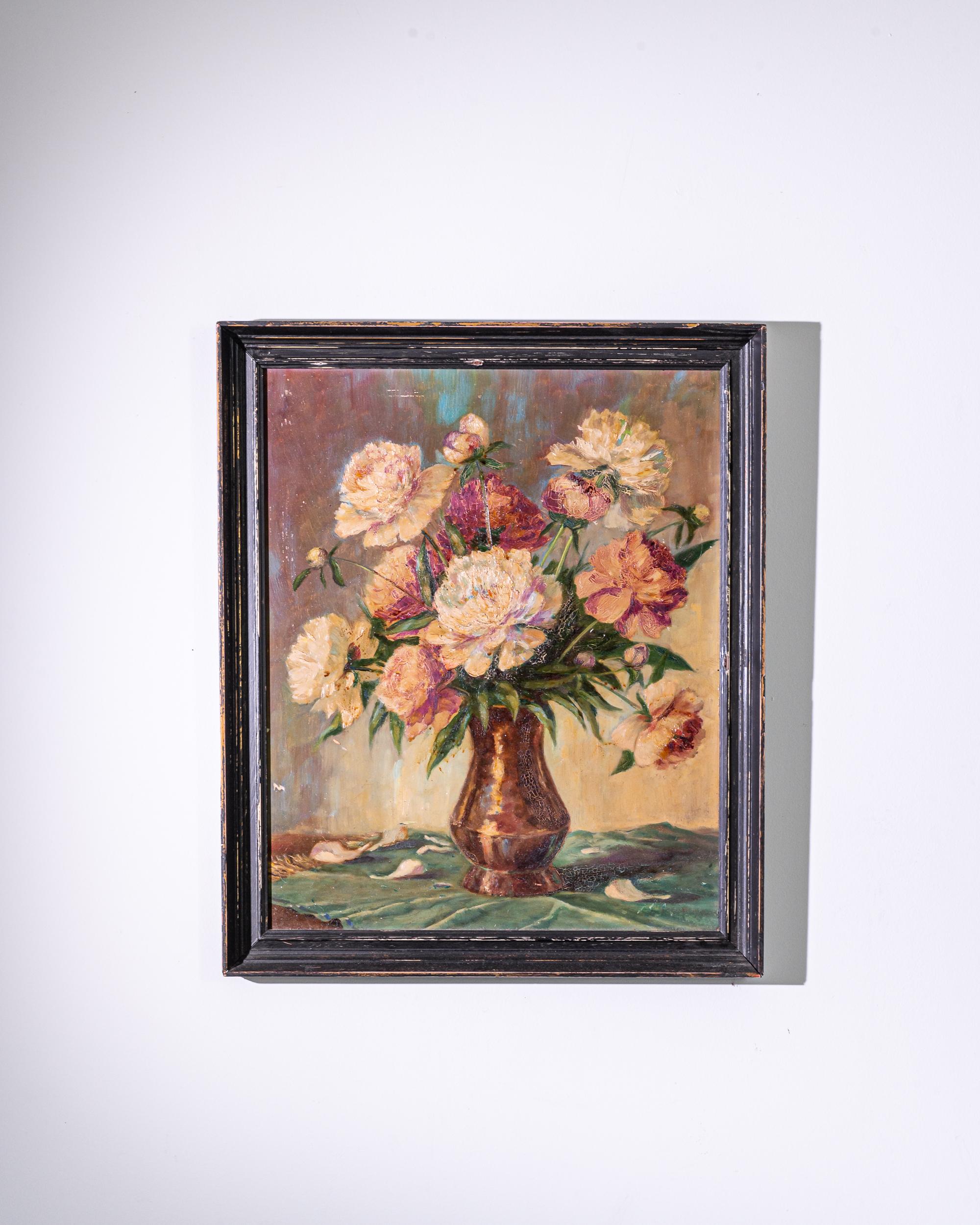 A vintage painting in a wooden frame, depicting flowers in a copper vase. Painted in 20th Century Czechia, the genre is still life, but the composition is dynamic and full of motion. The flowers are blowsy, falling open under their own weight;