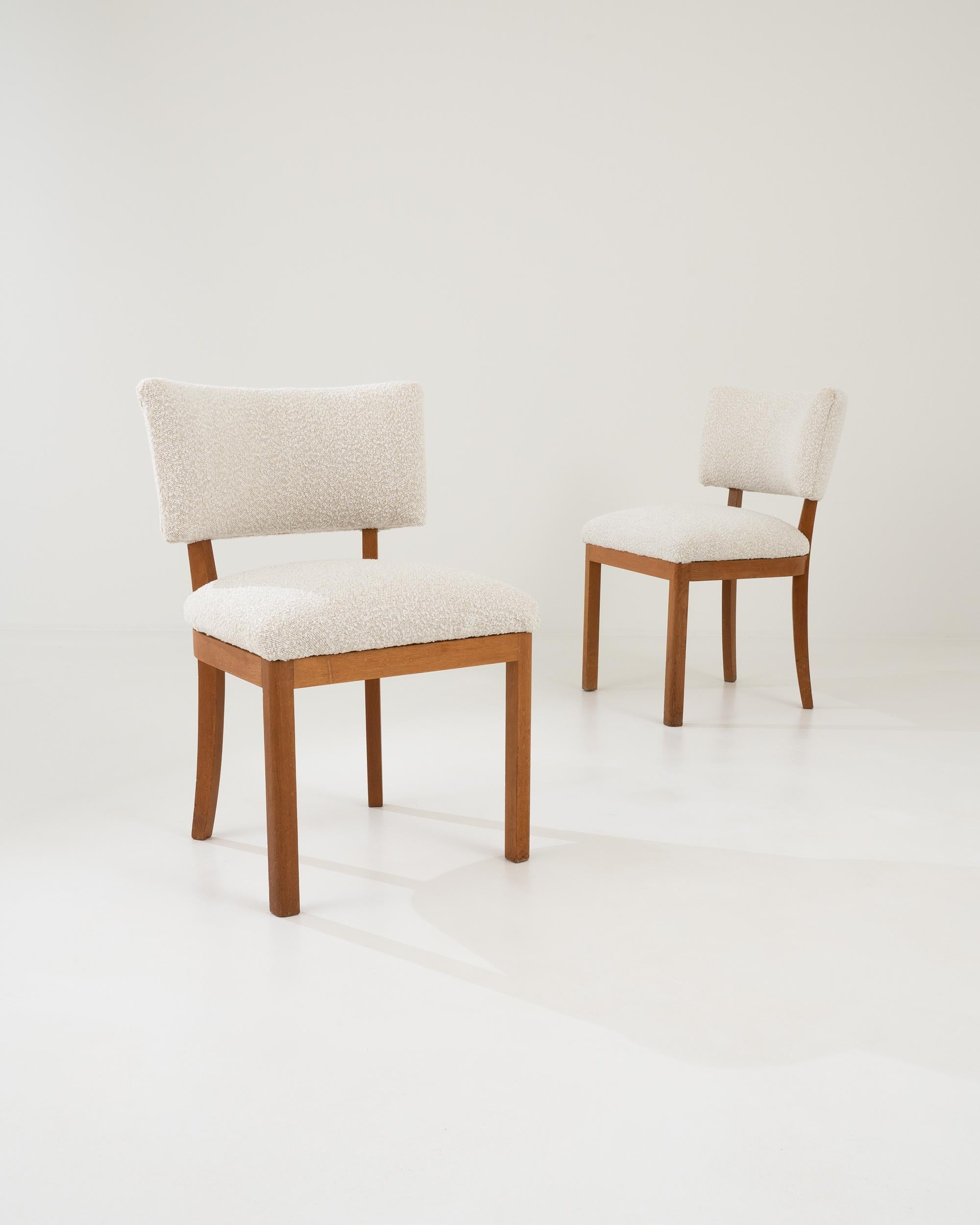 Simple yet sophisticated, this pair of vintage wooden dining chairs have a timeless appeal. Made In Czechia in the 20th century, the design combines the graphic stylishness of Midcentury Modern design with a homey straightforwardness. The hard