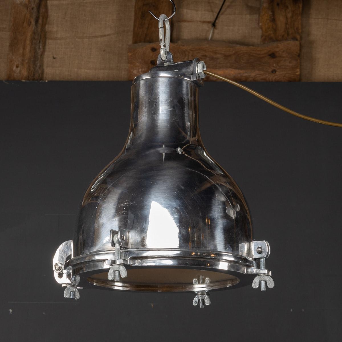 A fabulous polished aluminium light that once belonged to a Danish ship that circumnavigated the globe delivering cargo goods. Now, beautifully salvaged and restored to its former glory.

CONDITION
In Good Condition. (please refer to