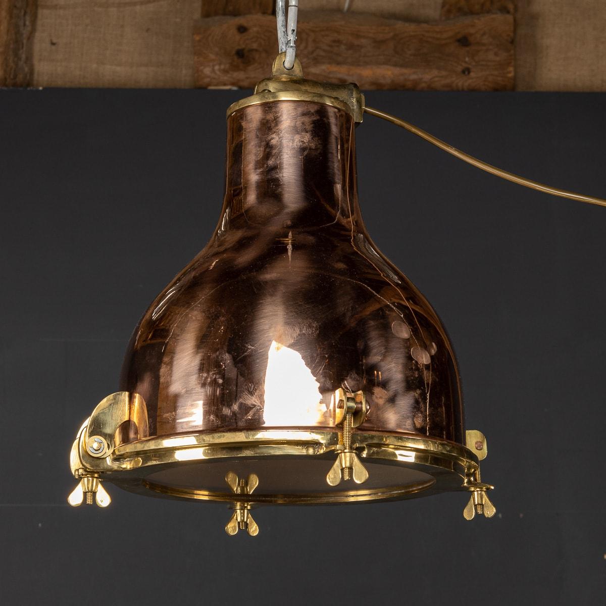A fabulous polished brass light that once belonged to a Danish ship that circumnavigated the globe delivering cargo goods. Now, beautifully salvaged and restored to its former glory.

CONDITION
In Good Condition. (please refer to