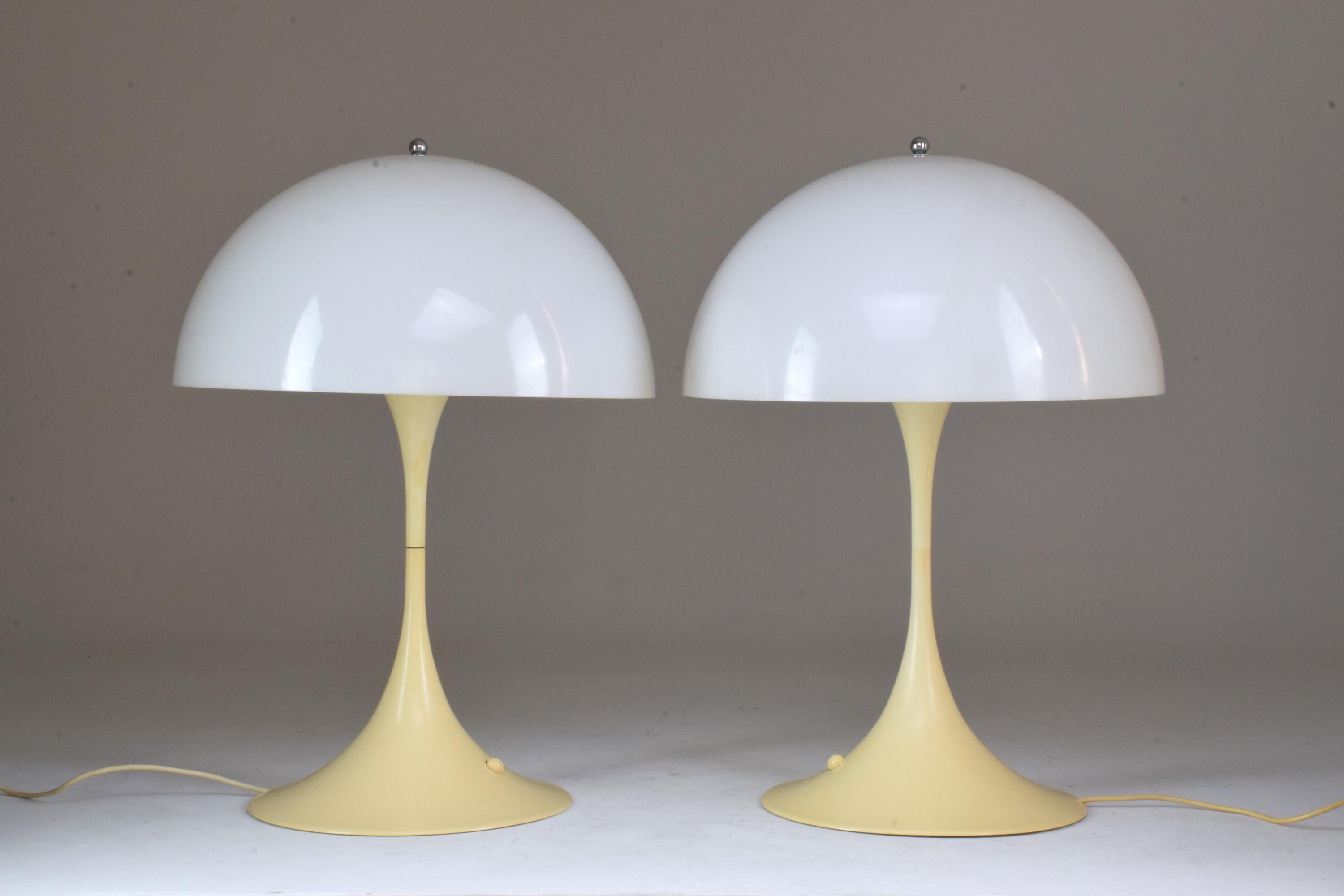 A Classic design staple pair of vintage table lamps designed by the iconic Verner Panton for Louis Poulsen Denmark in the 1970s. This 