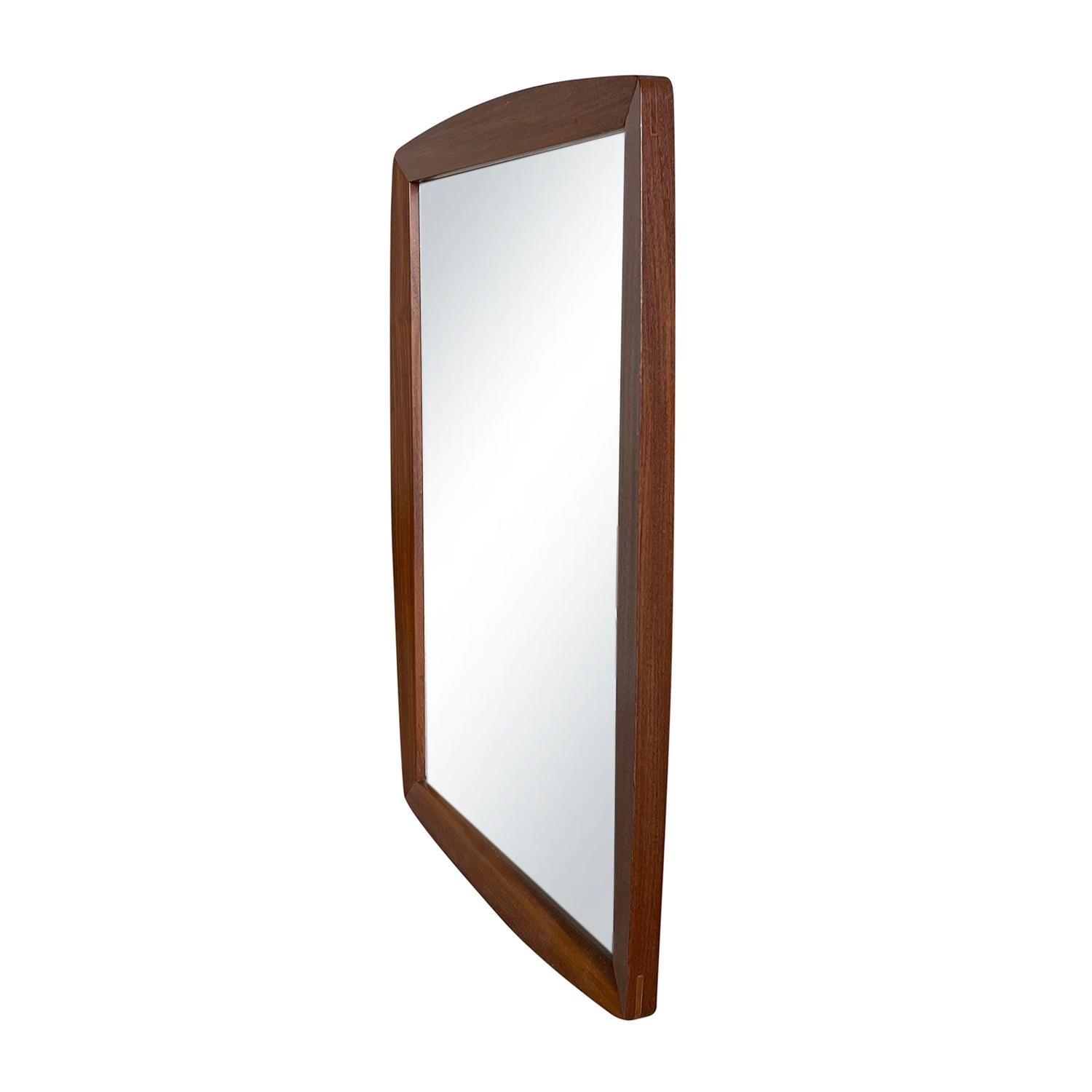 dark brown framed mirror