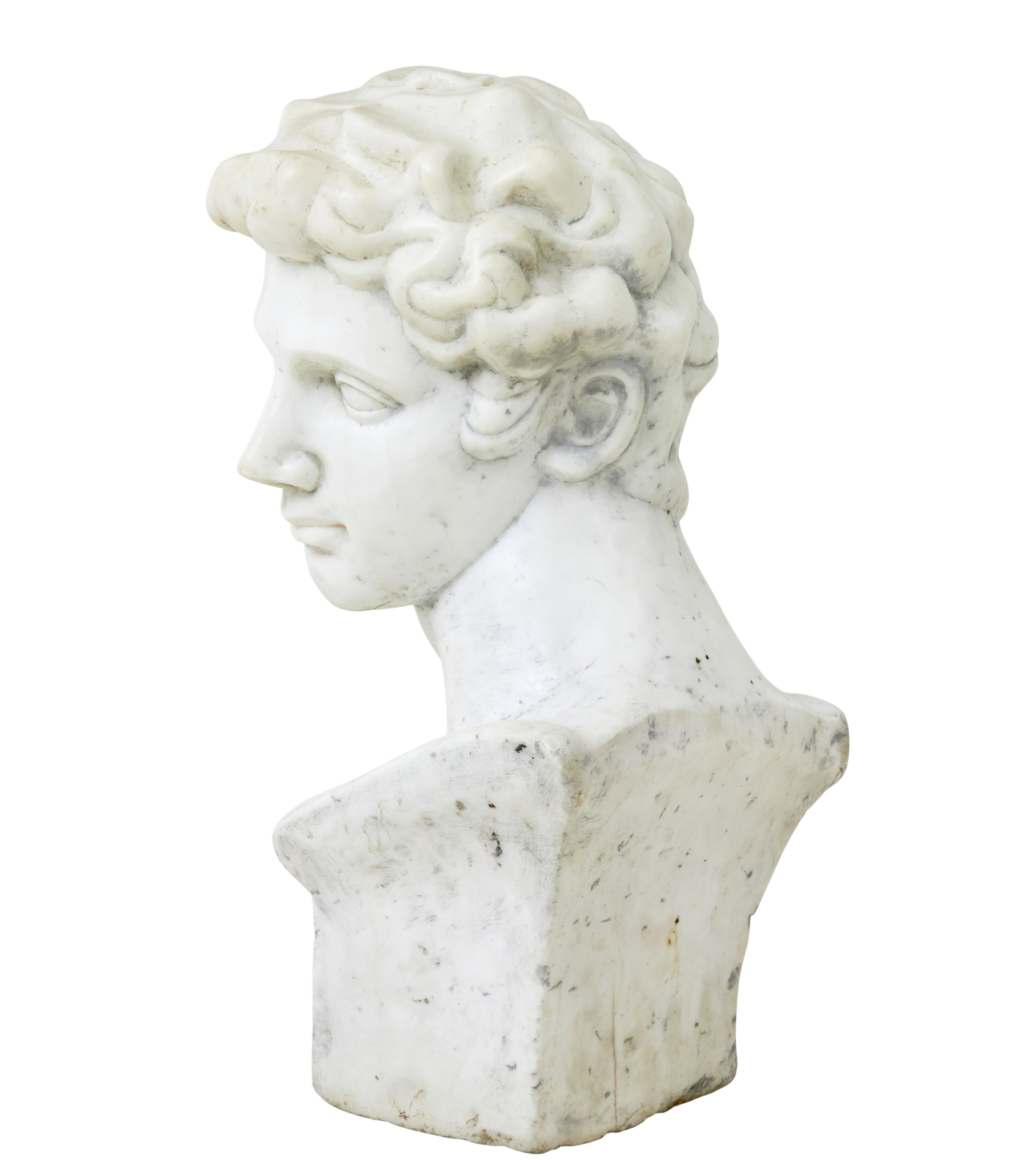 20th century marble bust in the Grecian style circa 1950.

Good quality piece of interior or exterior decoration.

Made from solid marble and a 2 man lift this very heavy piece ideally sits on the floor or would need substantial support to be