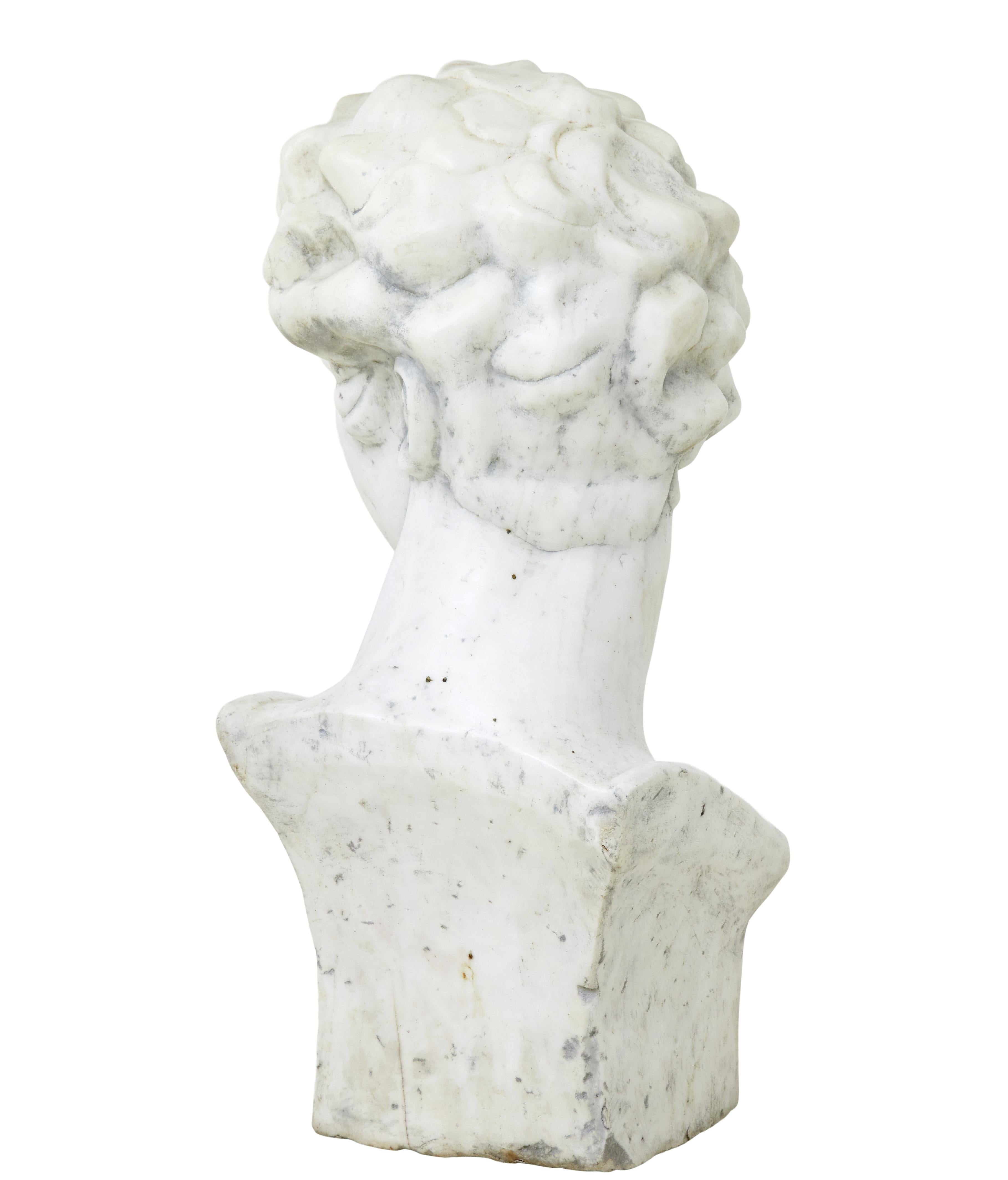 Carved 20th century decorative marble bust in the Greco Roman style For Sale